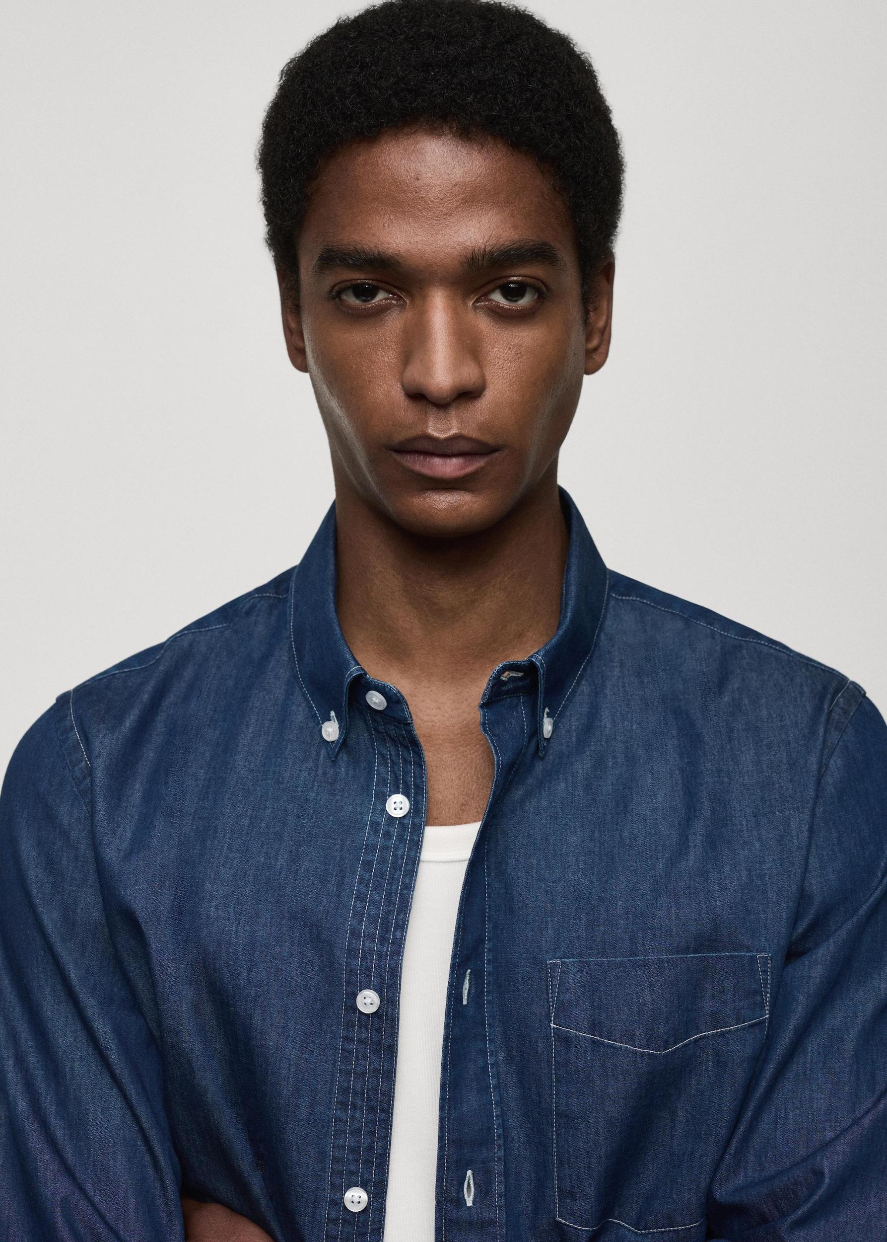 Regular-fit chambray cotton shirt - Men | MANGO USA Product Image