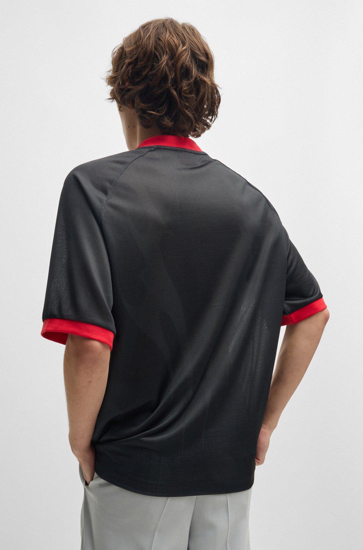 Relaxed-fit football-style mesh T-shirt with seasonal print Product Image