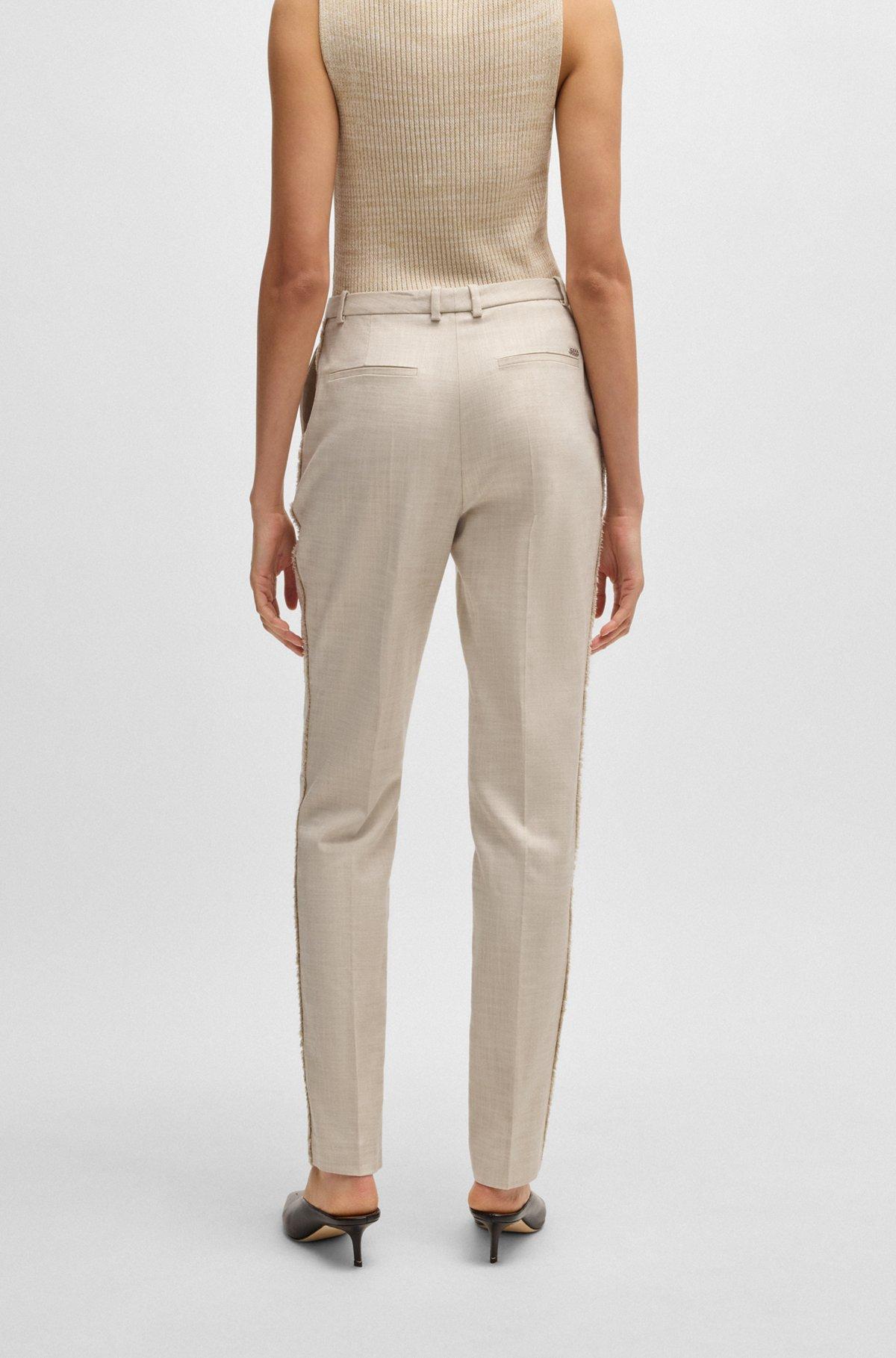 Relaxed-fit trousers in melange stretch fabric Product Image