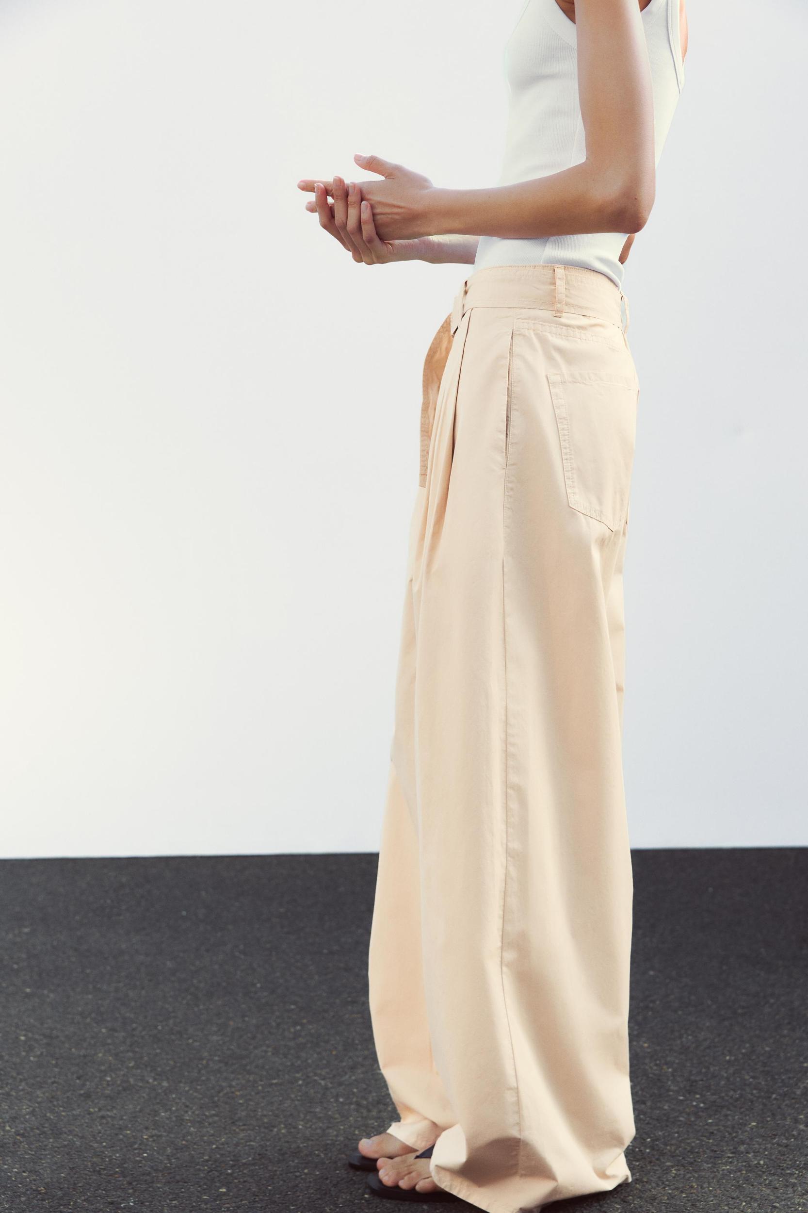 PLEATED BELTED PANTS Product Image