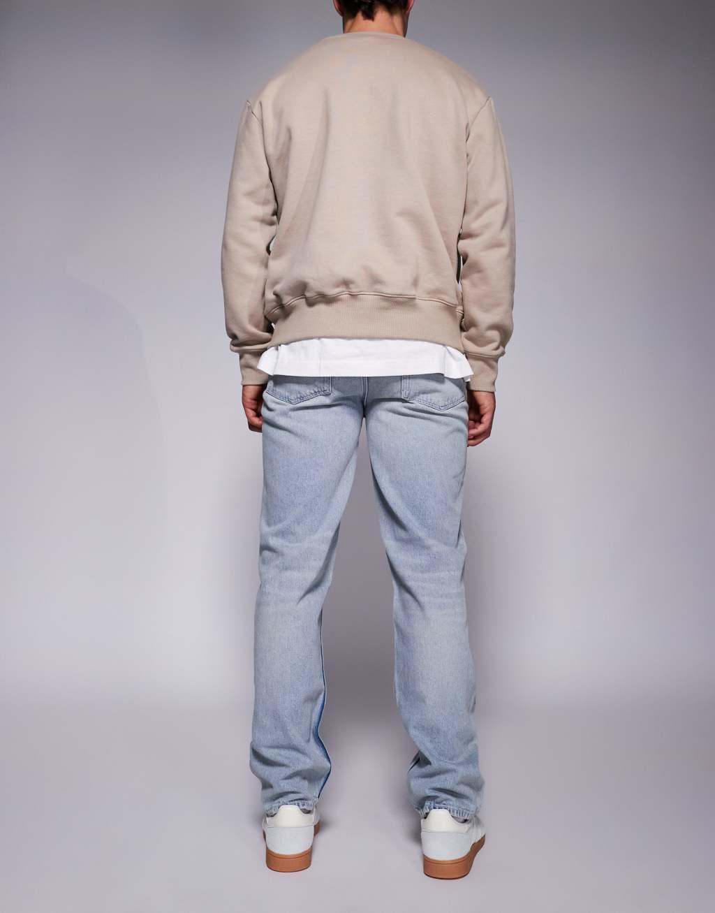 ASOS DESIGN straight leg jeans in light wash blue Product Image