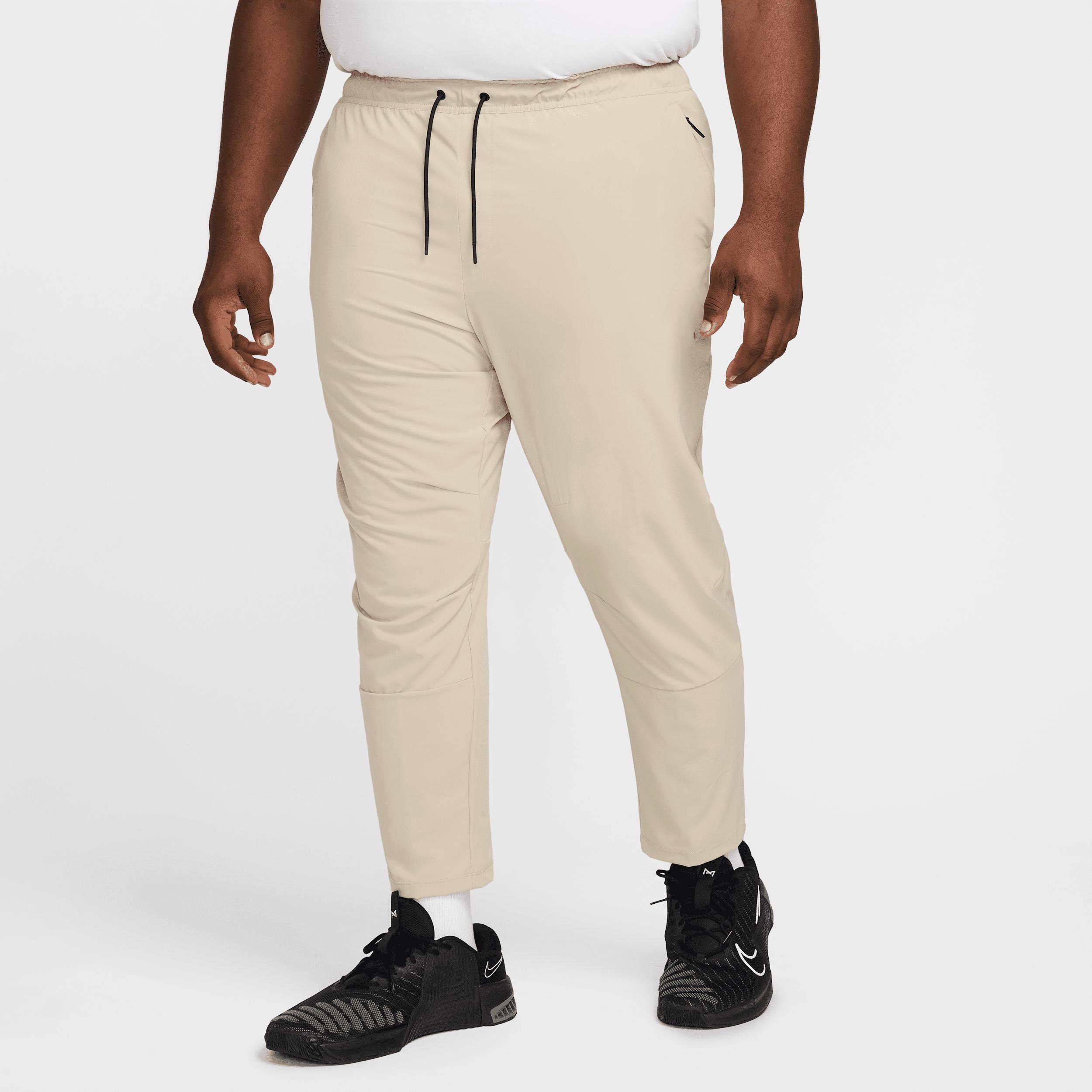 Nike Mens Unlimited Dri-FIT Tapered Leg Versatile Pants | FB7546-251 Product Image