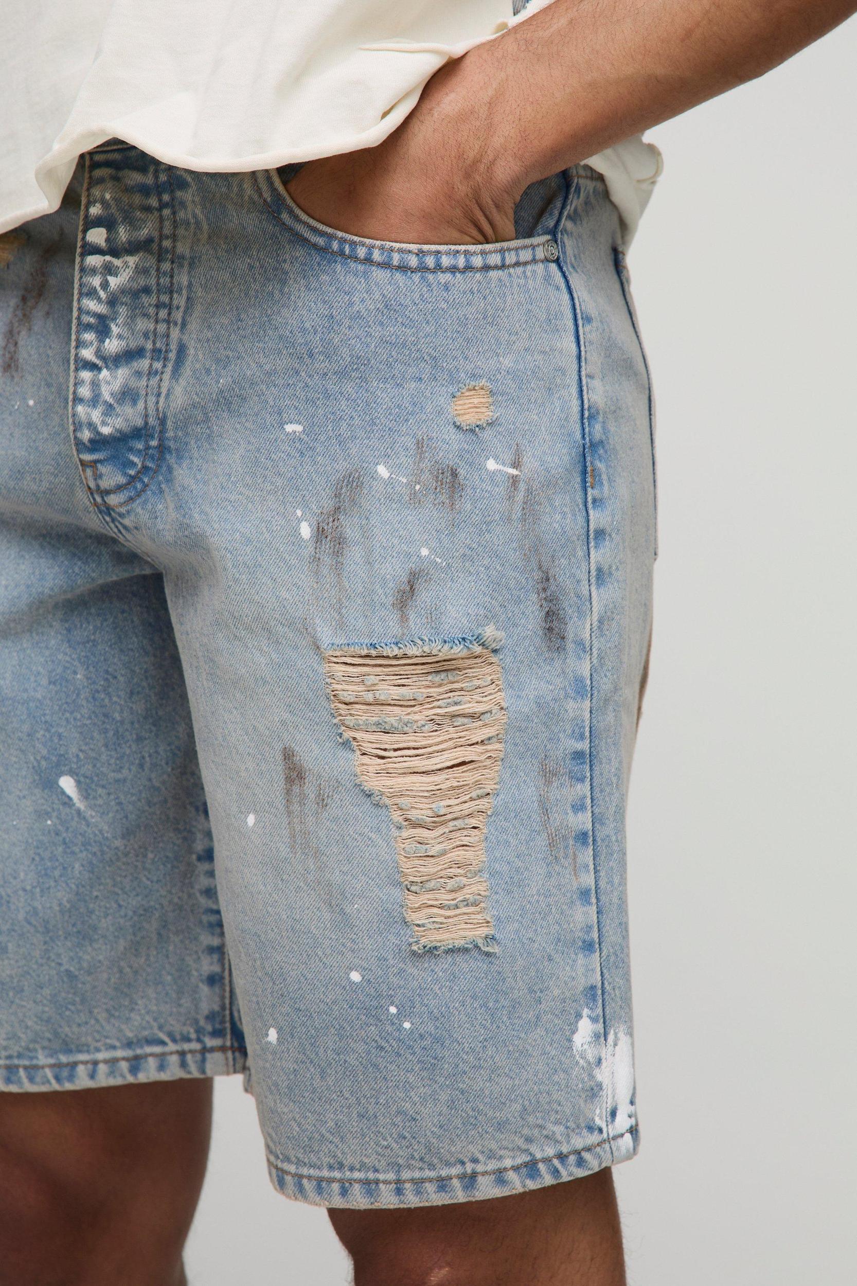 Relaxed Ripped Paint Splatter Rigid Denim Shorts In Light Blue | boohooMAN USA Product Image