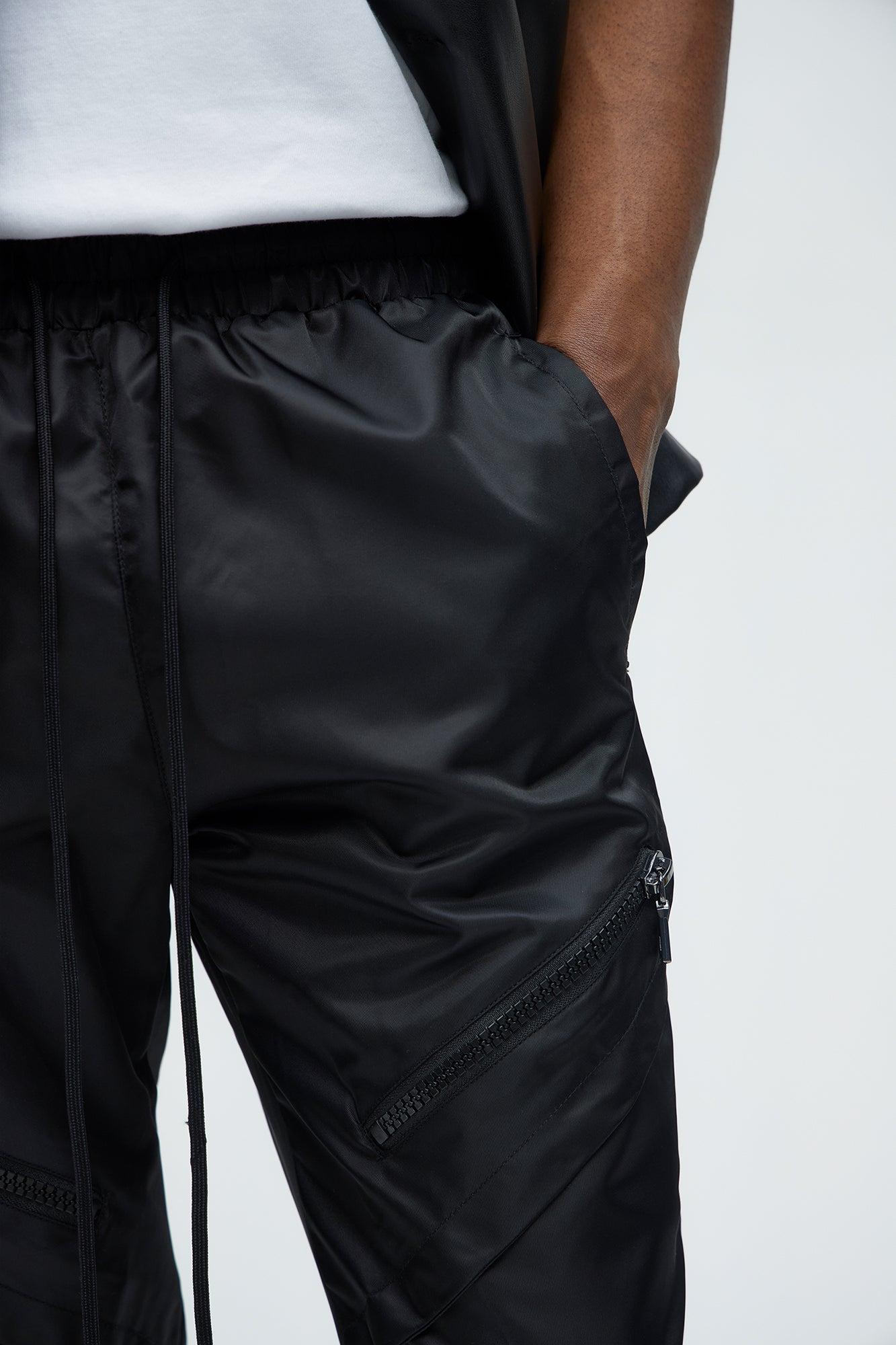 Play The Track Stacked Slim Flare Nylon Pants - Black Product Image