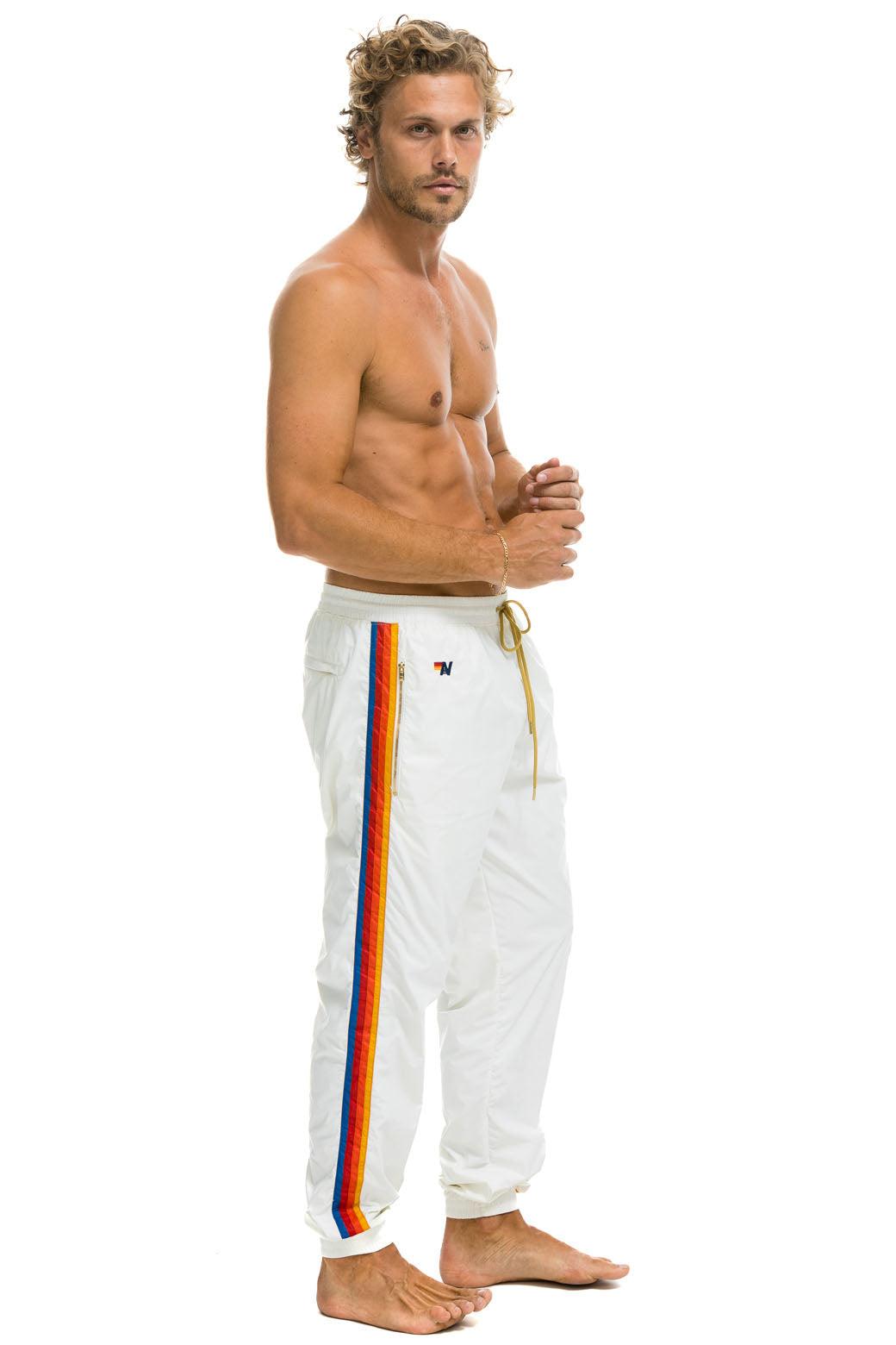 MEN'S 4 STRIPE WIND PANT - WHITE Male Product Image