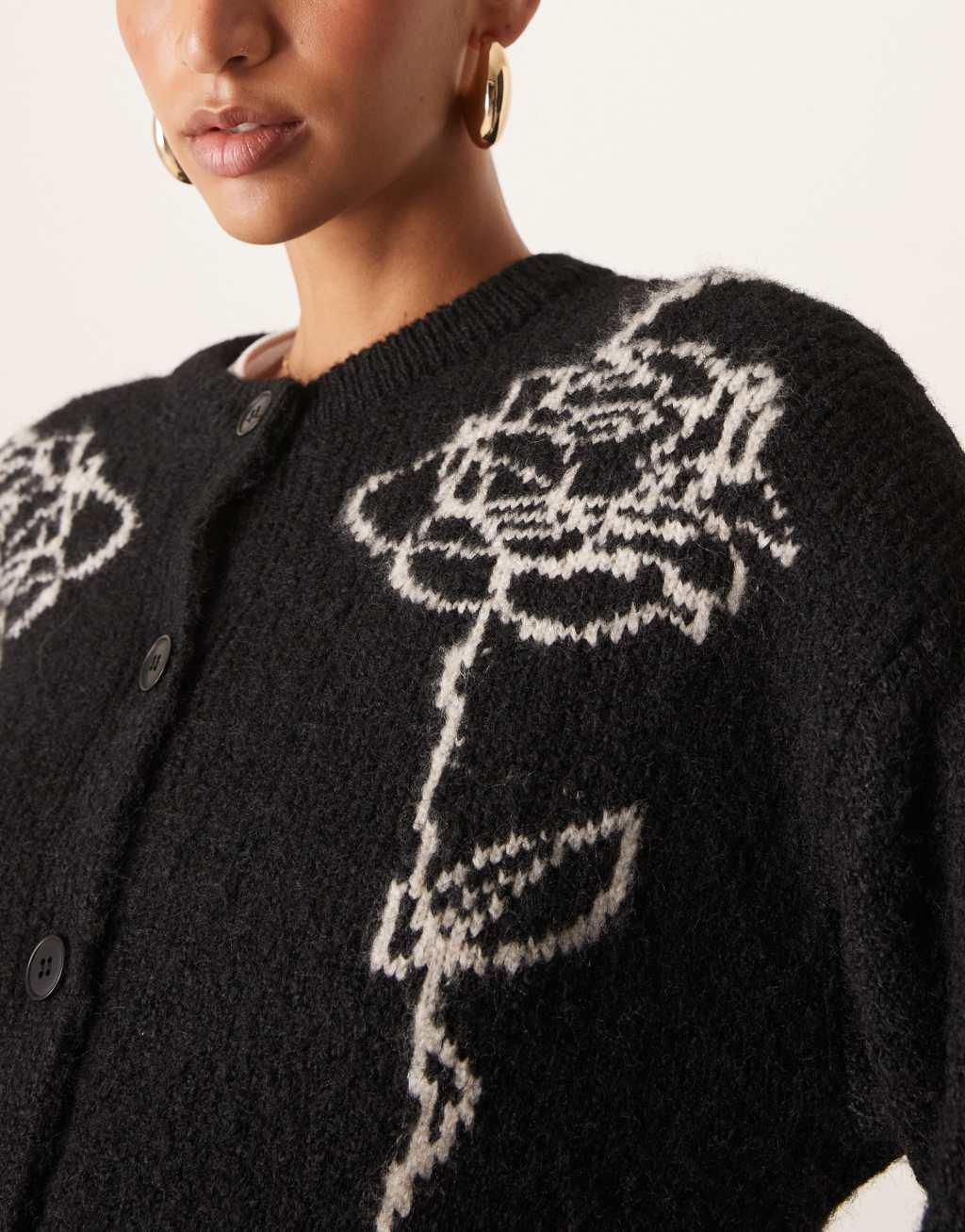 ASOS DESIGN wool blend knitted cardigan with contrast floral in black Product Image