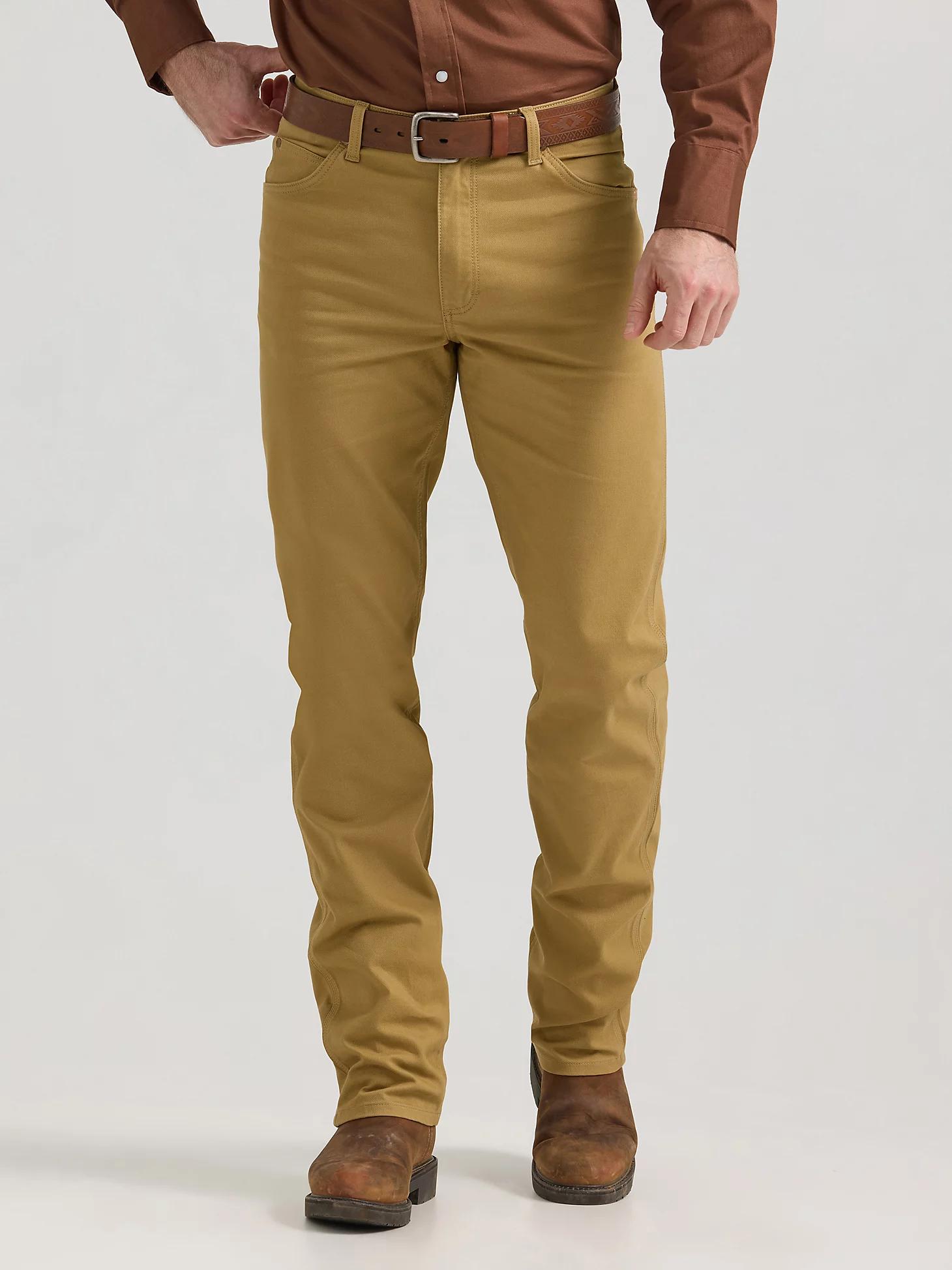 Premium Performance Tough Comfort Cowboy Cut® Regular Fit Canvas Jean | Men's JEANS | Wrangler® Product Image