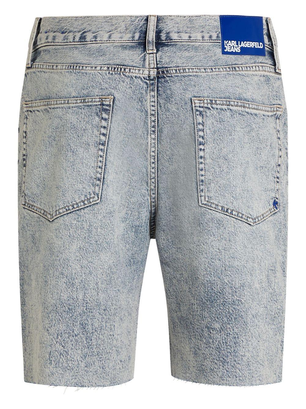 distressed relaxed denim shorts Product Image