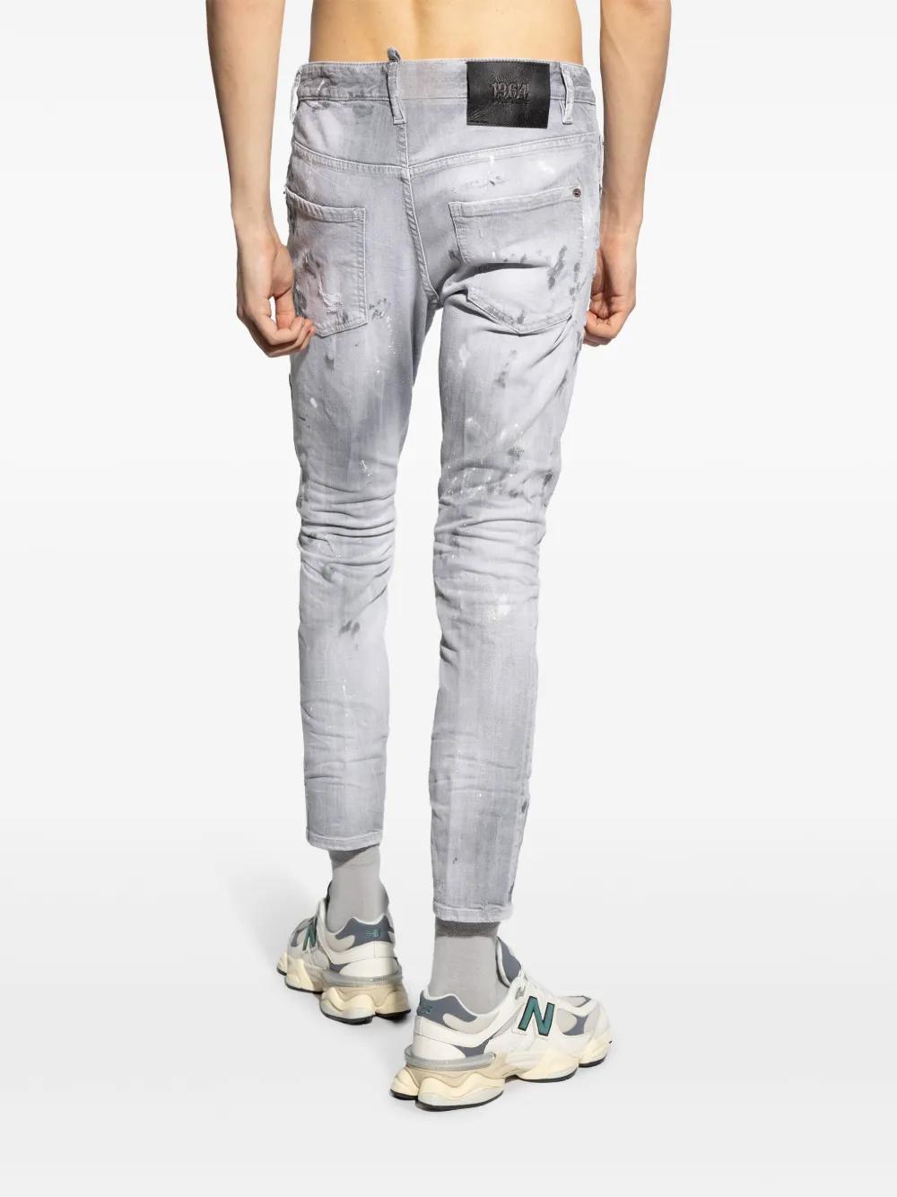 Skater distressed-finish jeans Product Image
