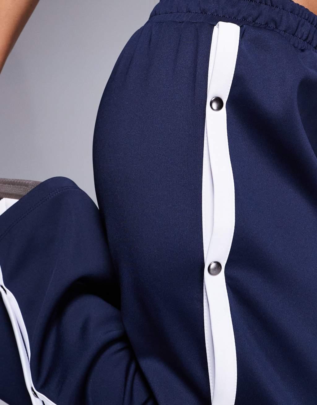 ASOS DESIGN wide leg pants with stripe and snaps in navy Product Image