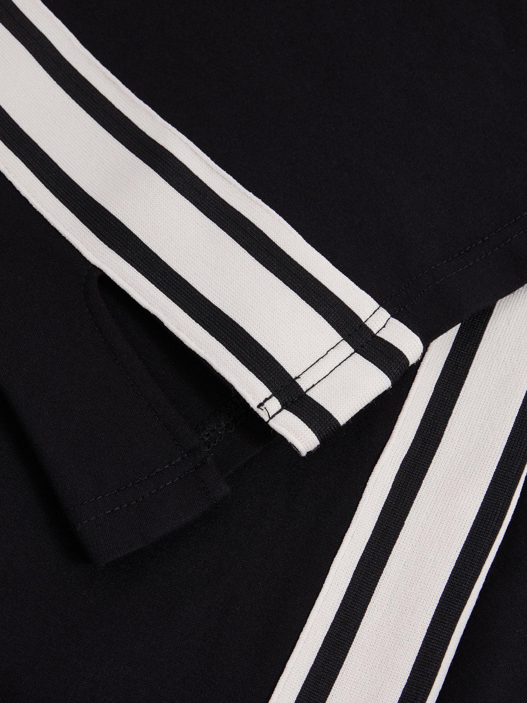 Flared Track Trousers in Black Product Image