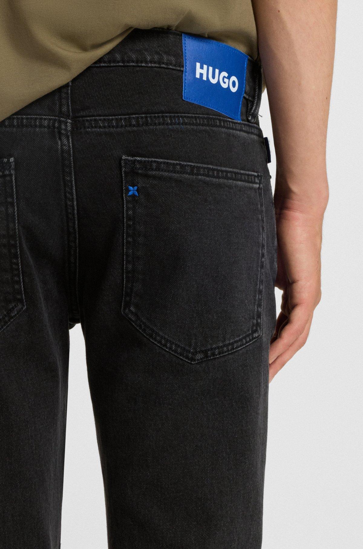 Skinny-fit jeans in washed black denim Product Image
