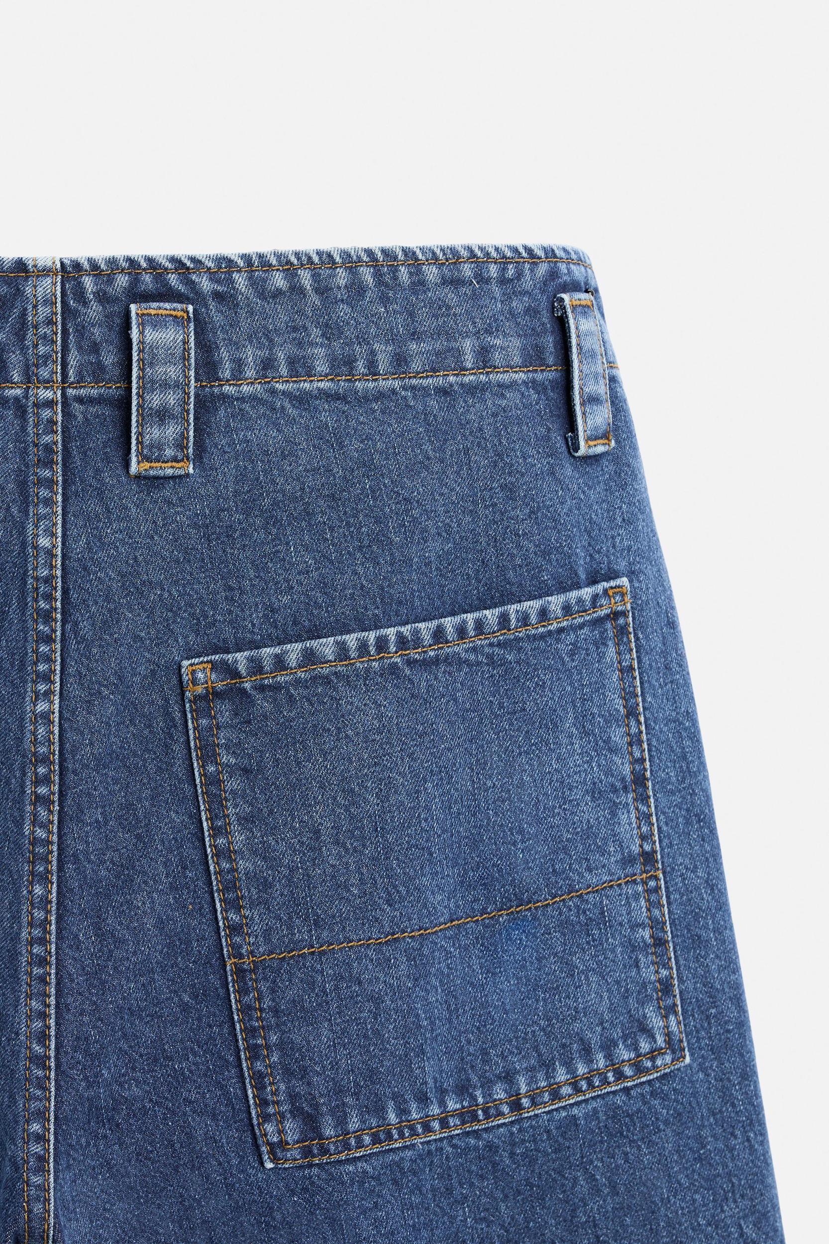 PLEATED STRAIGHT FIT JEANS Product Image