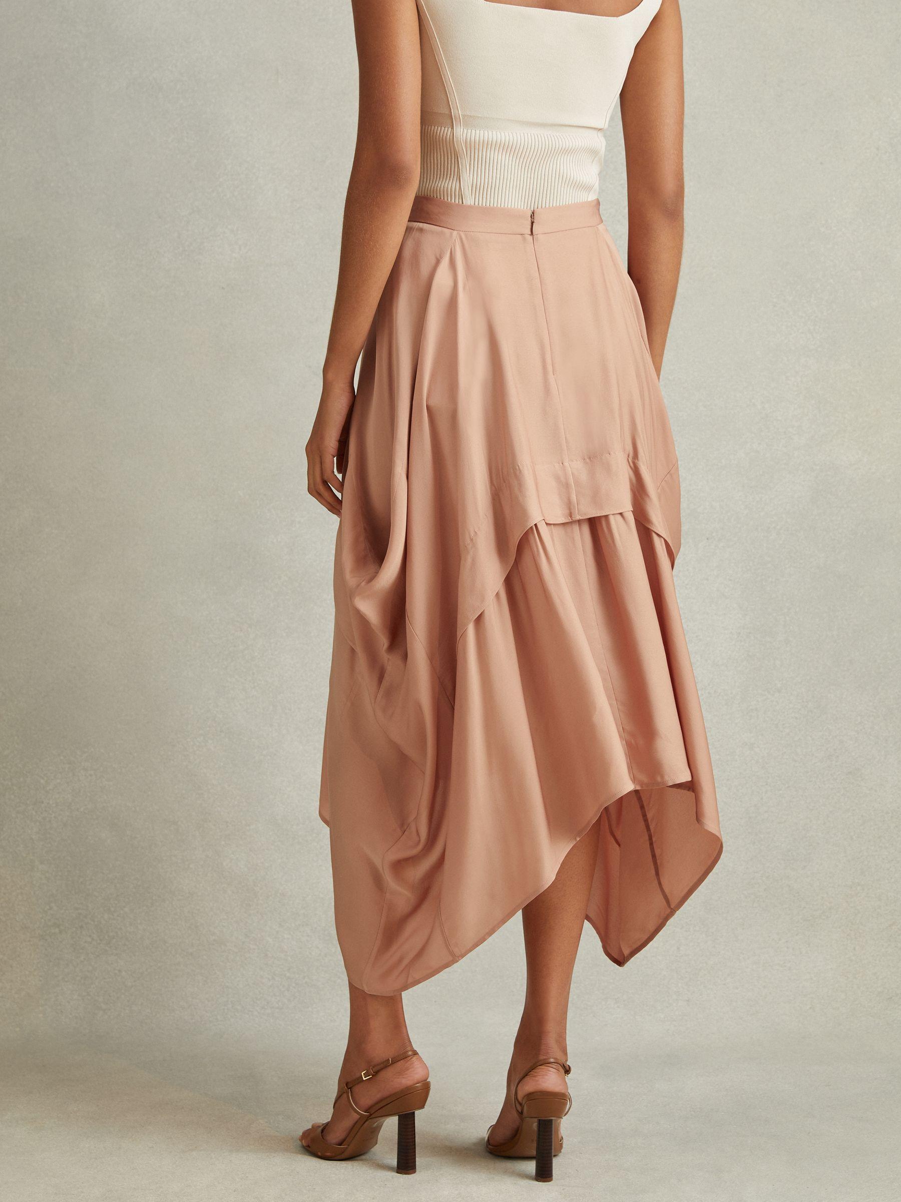 Side Pleat Asymmetric Midi Skirt in Nude Product Image