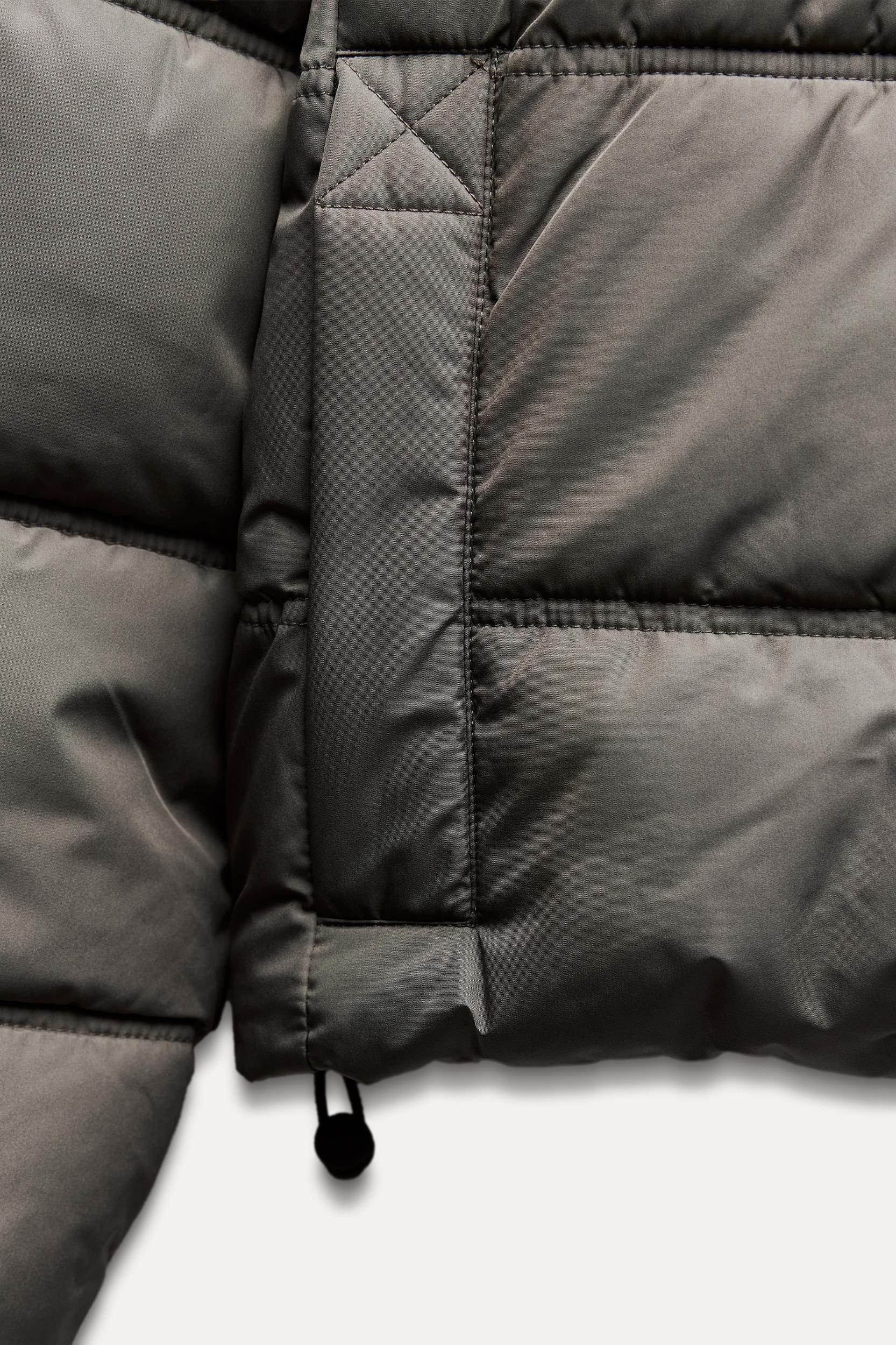 WATER AND WIND PROTECTION SHORT QUILTED ANORAK Product Image
