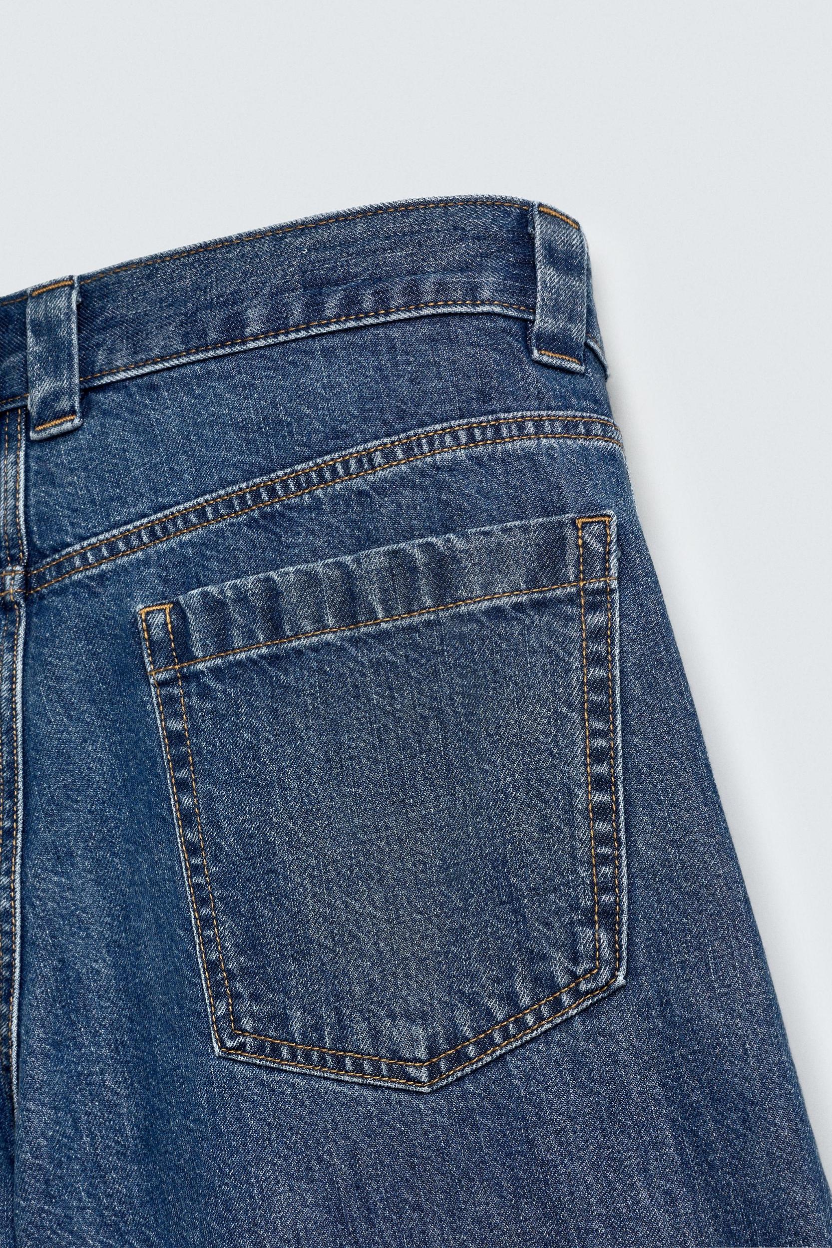 PLEATED RELAXED FIT DENIM SHORTS Product Image