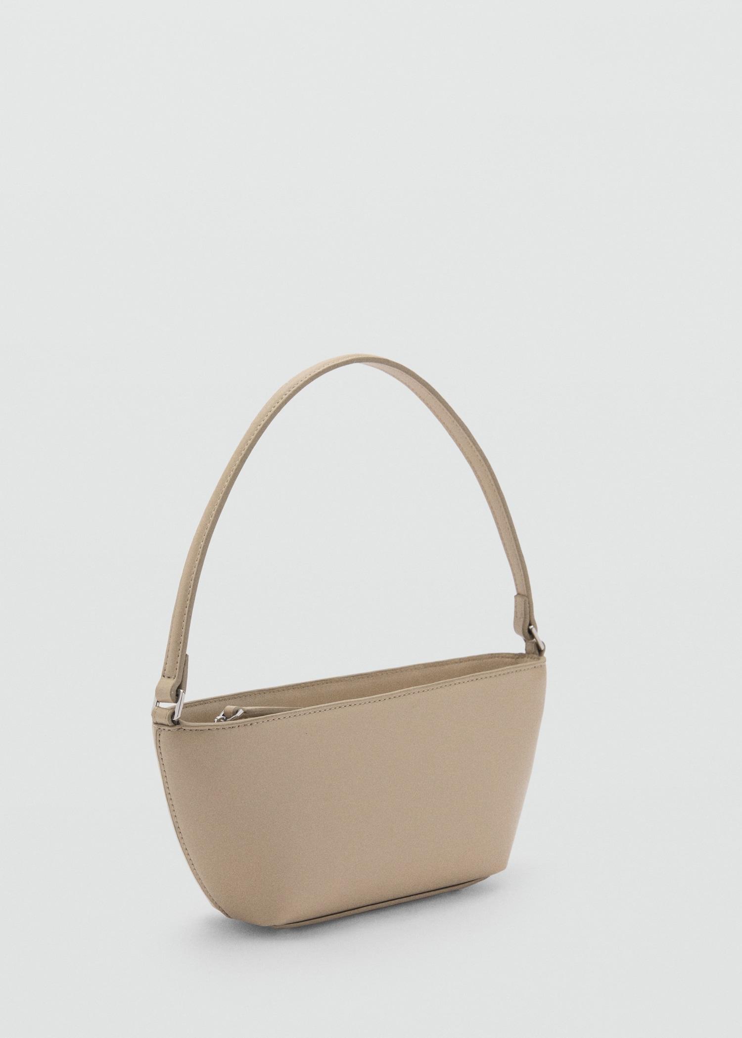 Oval shoulder bag - Women | MANGO USA Product Image