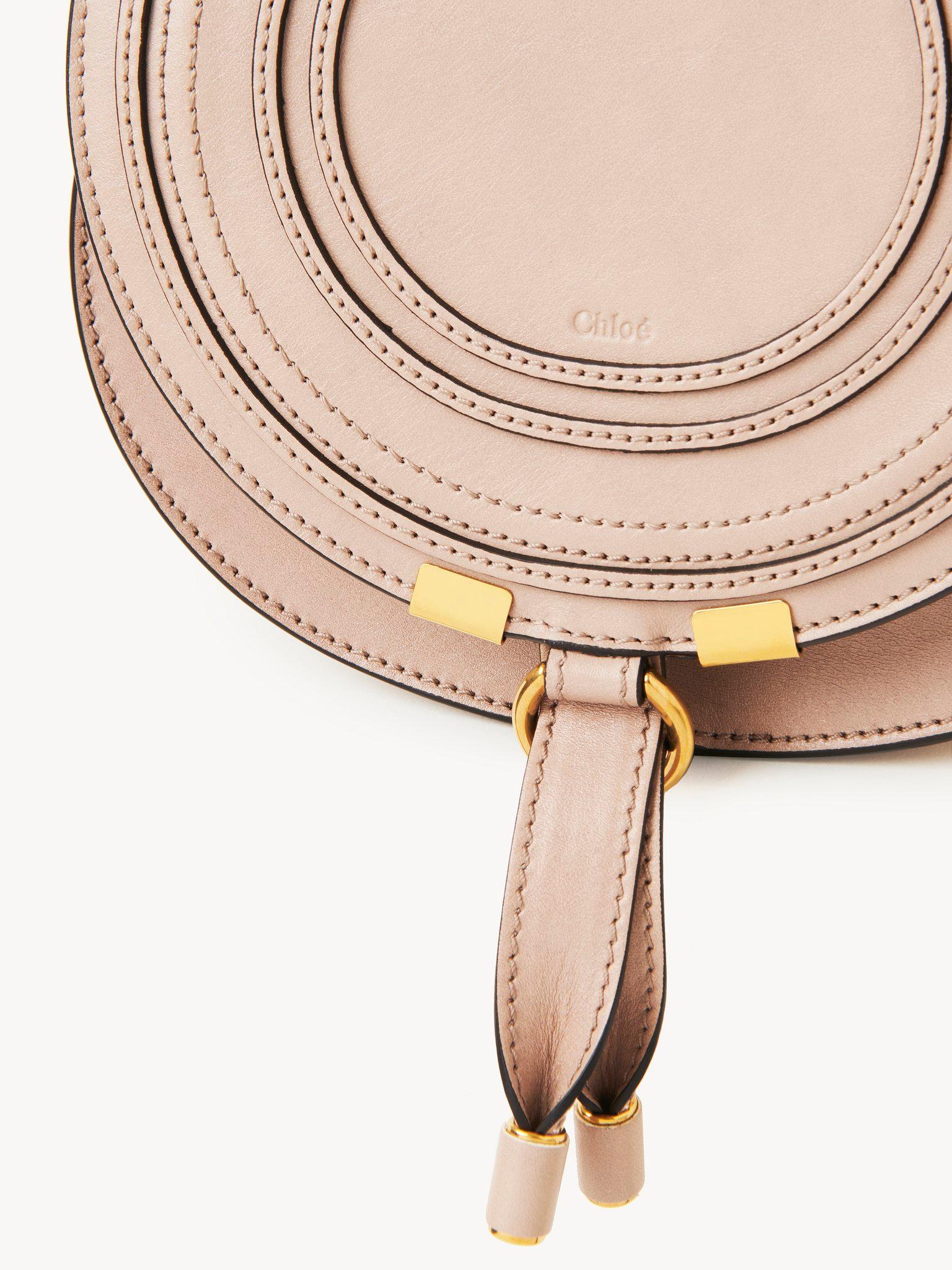 Small Marcie saddle bag in shiny leather Product Image