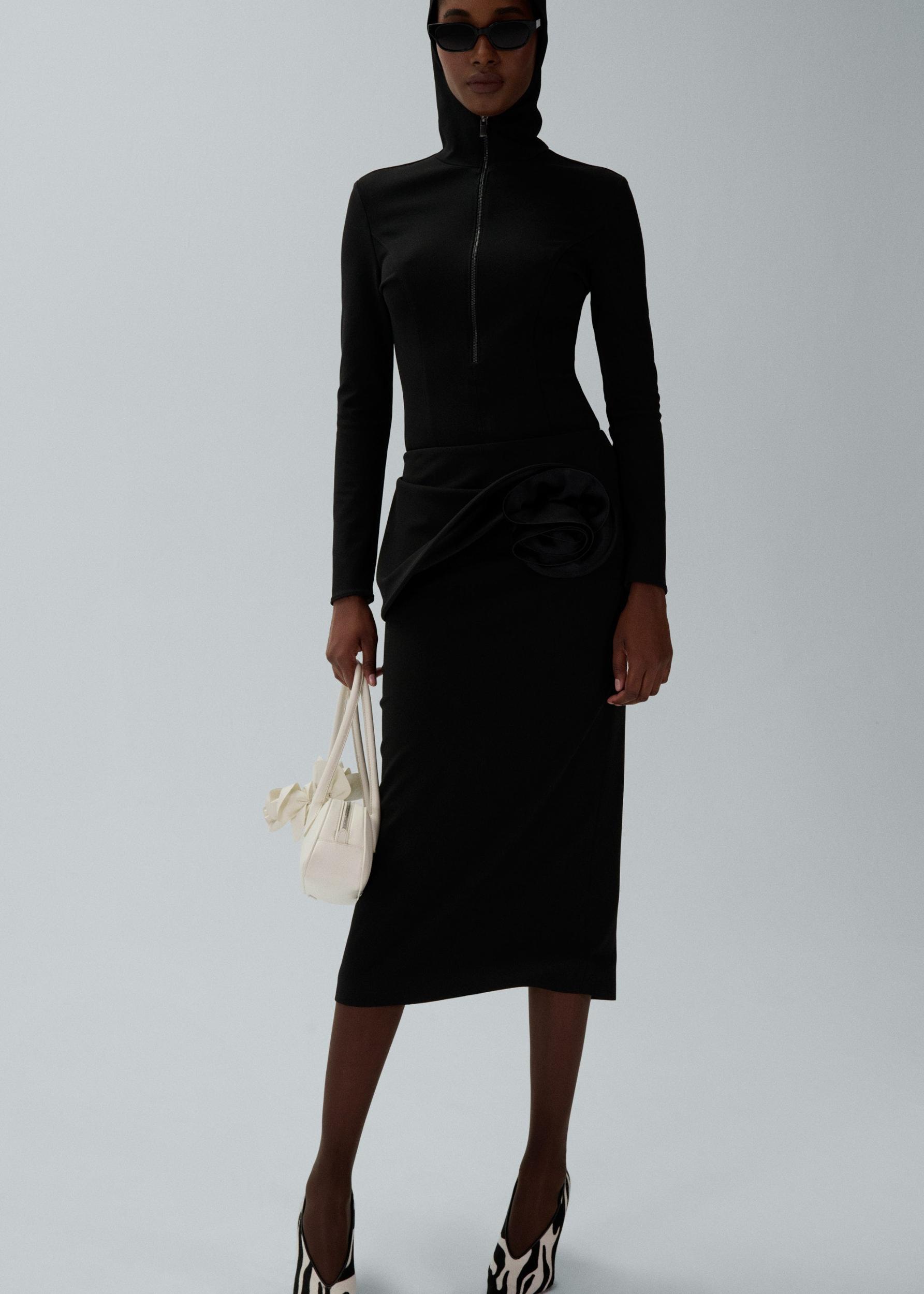 Floral appliqué midi skirt in black Product Image