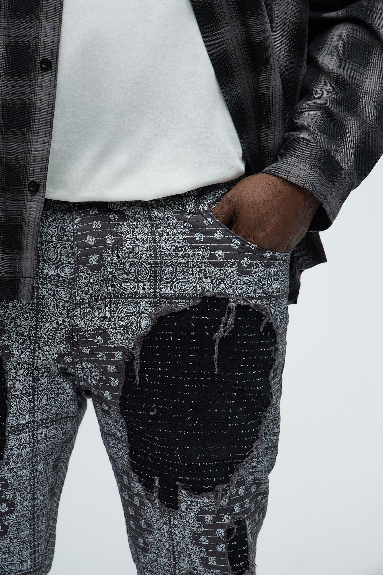 Shredded Shock Distressed Stacked Skinny Flare Jeans - Black Product Image