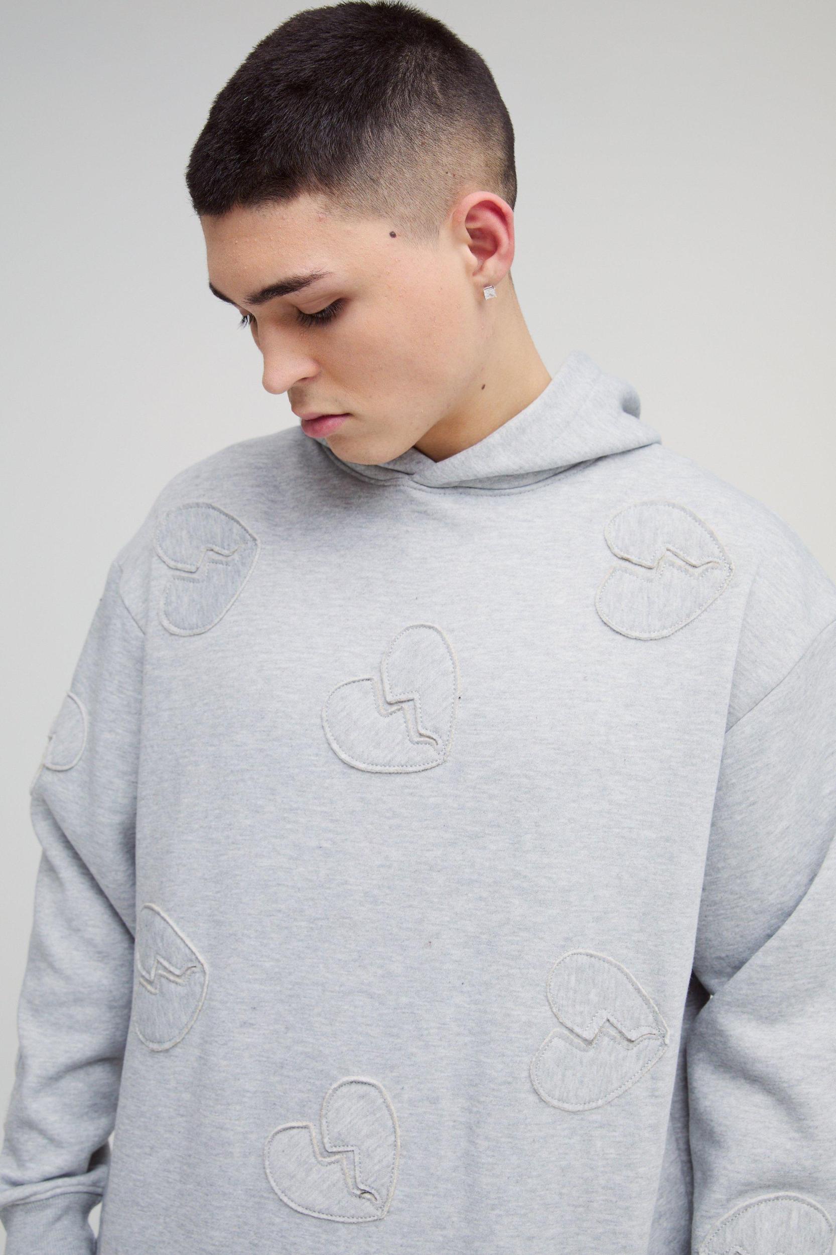 Oversized Boxy All Over Heart Applique Tracksuit | boohooMAN USA Product Image