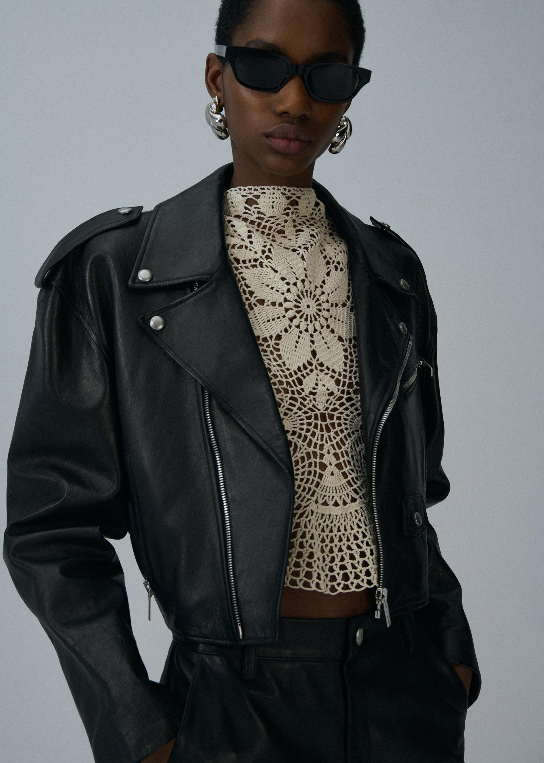 Cropped biker jacket in black leather Product Image