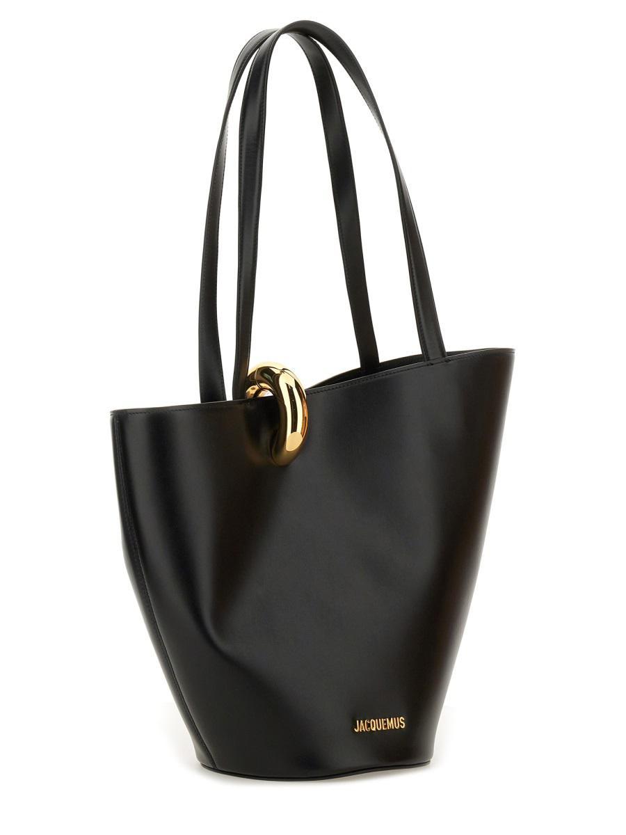 JACQUEMUS The Medium Bambola Asymmetric Leather Bucket Bag In Black 990 Product Image