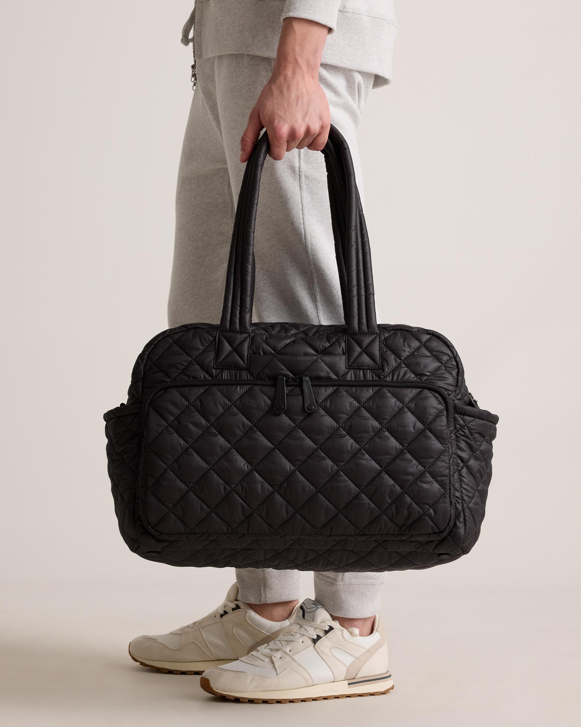 Quince | Women's Transit Quilted Duffle Bag in Black, Nylon Product Image