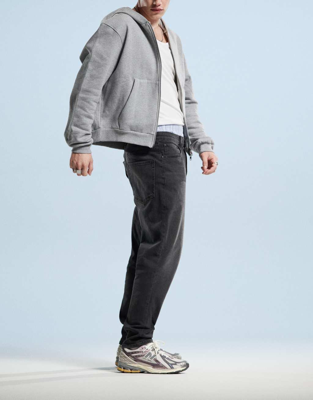 ASOS DESIGN tapered jeans in black wash Product Image