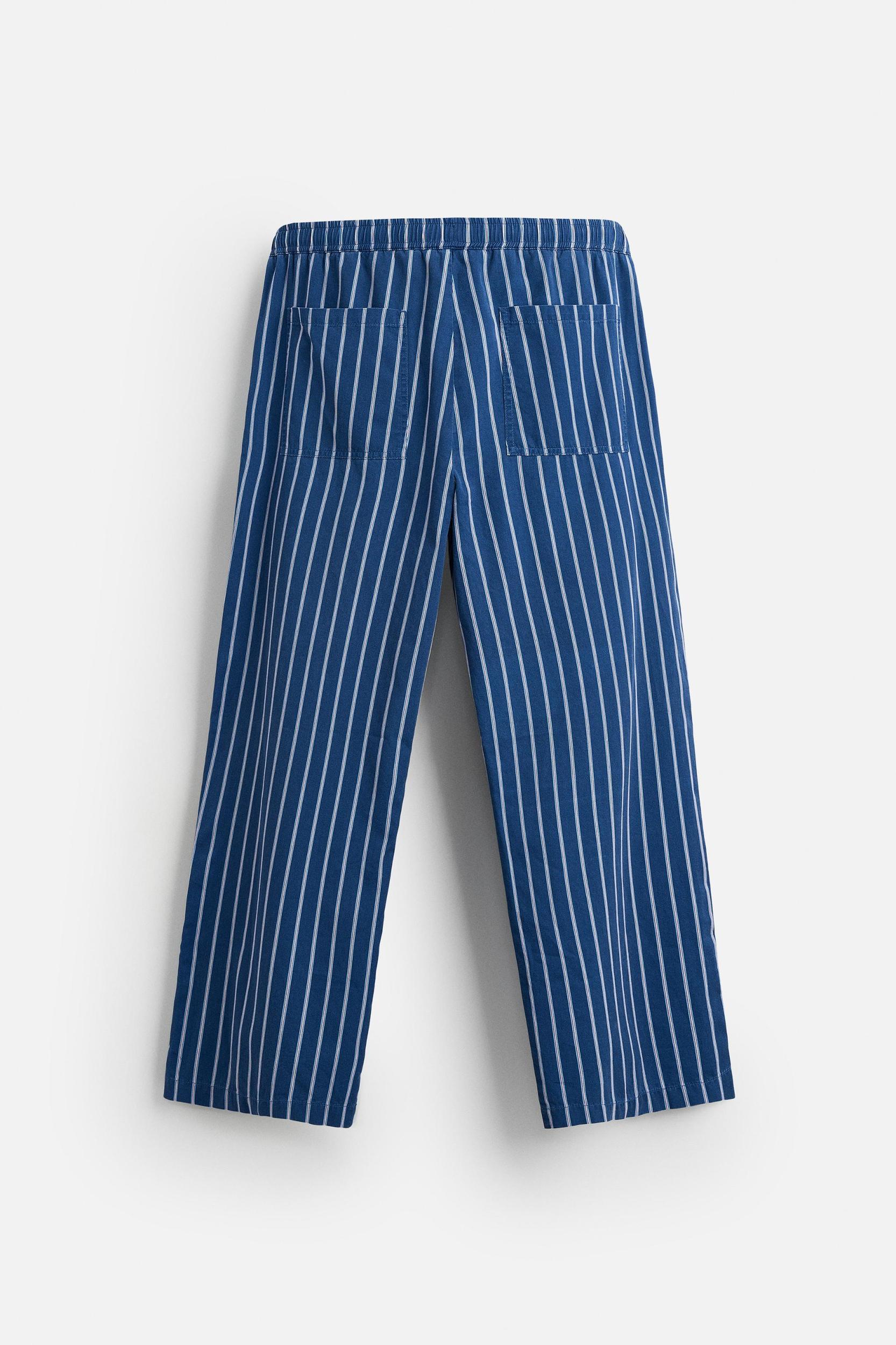 STRIPED RELAXED FIT PANTS Product Image