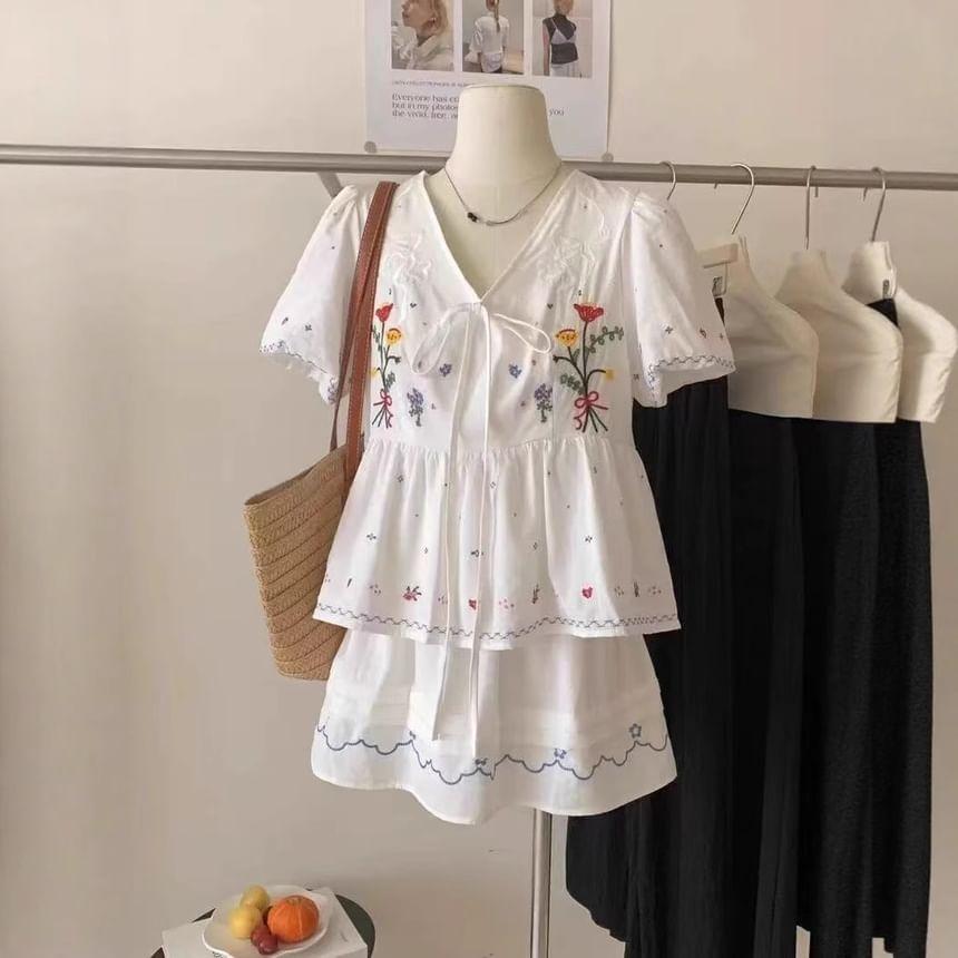 Puff-Sleeve V-Neck Floral Embroidered Bow Peplum Blouse / Elastic Waist Mini A-Line Skirt Product Image