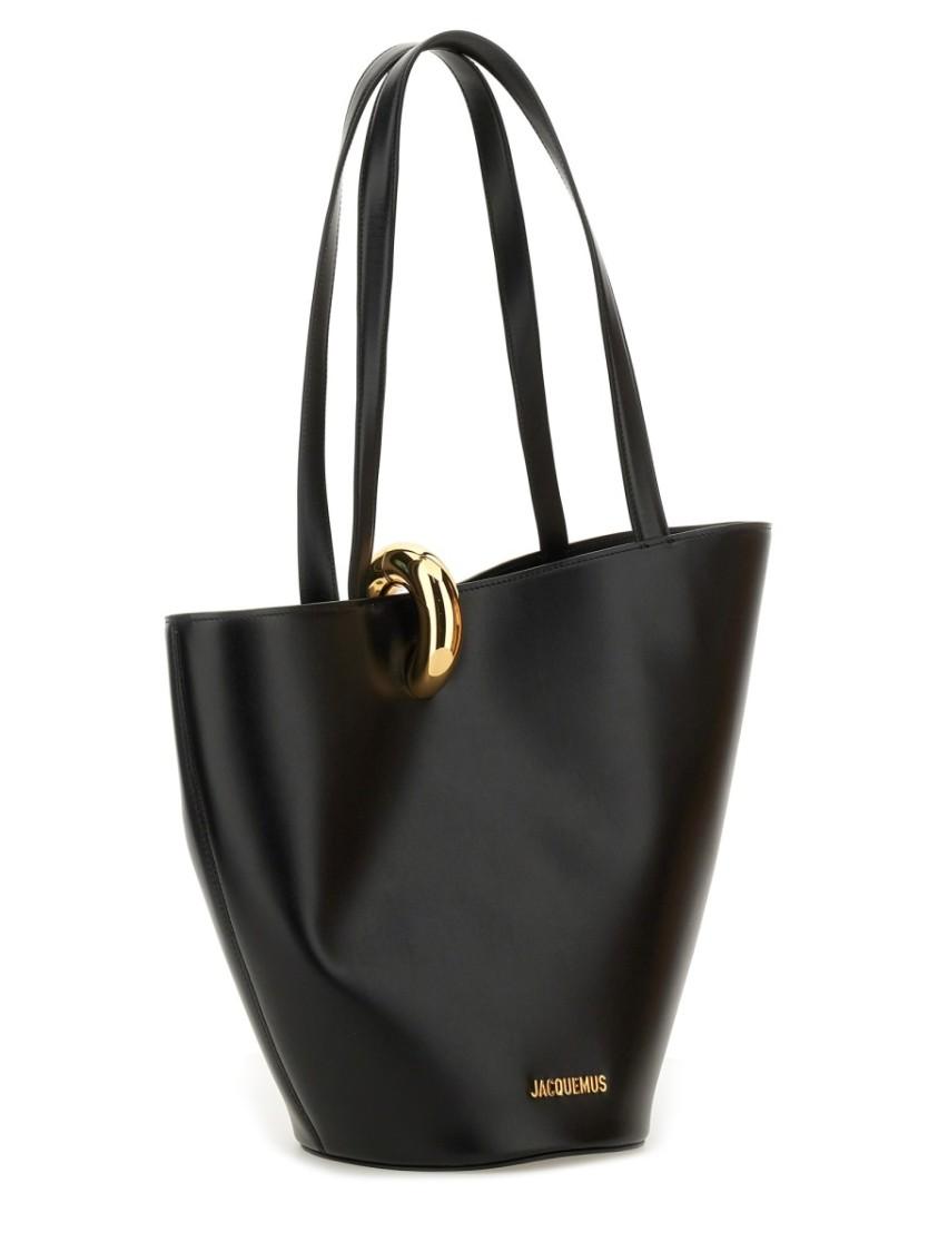JACQUEMUS The Medium Bambola Asymmetric Leather Bucket Bag In Black 990 Product Image