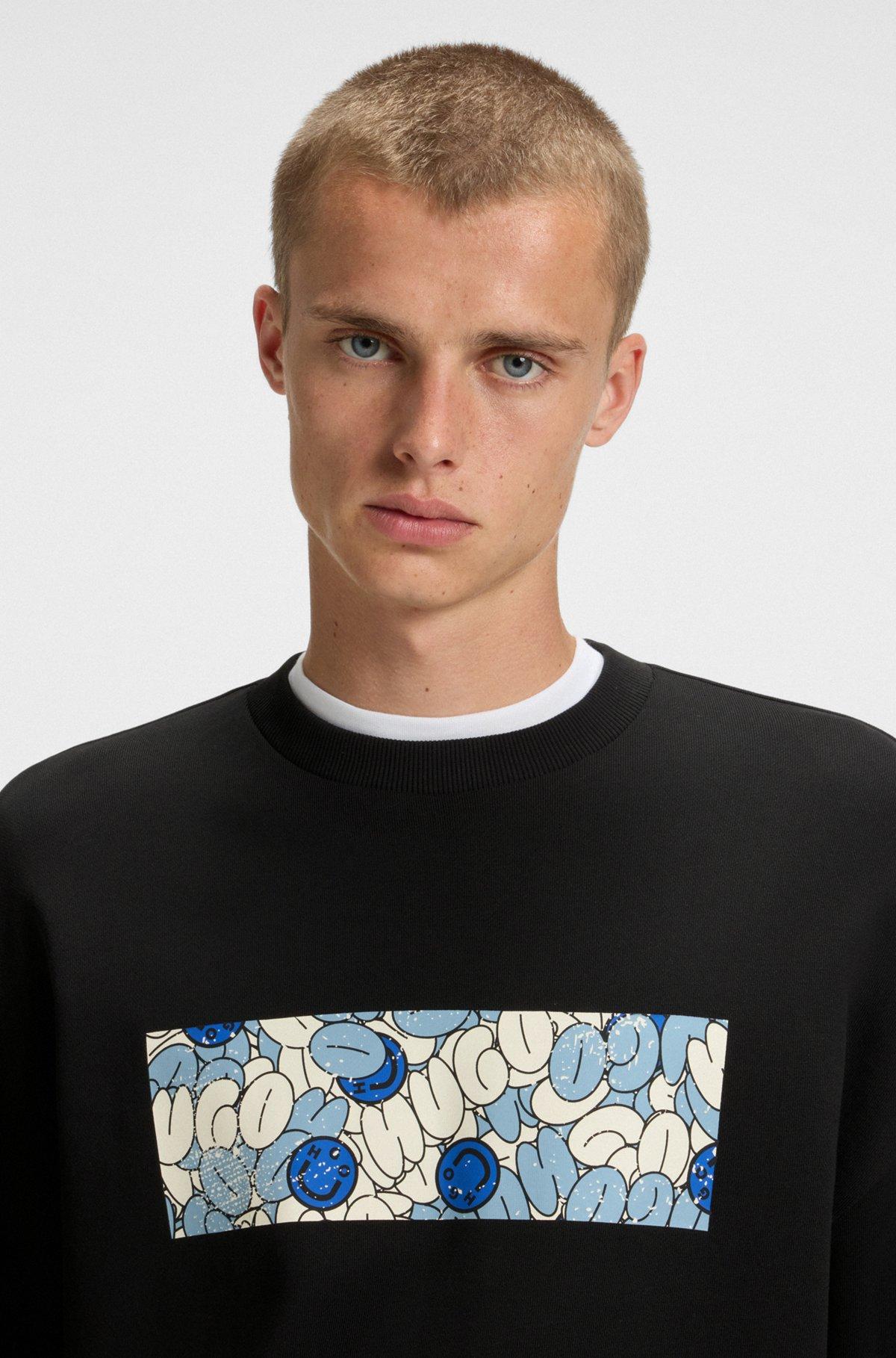 HUGO - Cotton-terry sweatshirt with logo artwork print - Black Product Image