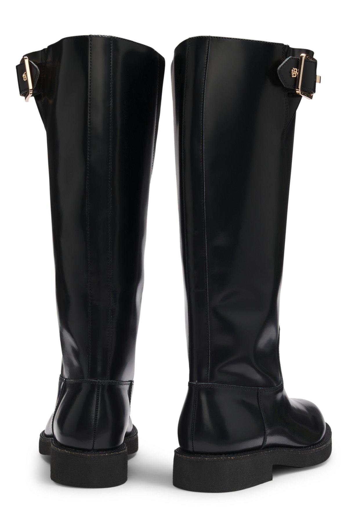 Knee boots in brush-off leather Product Image