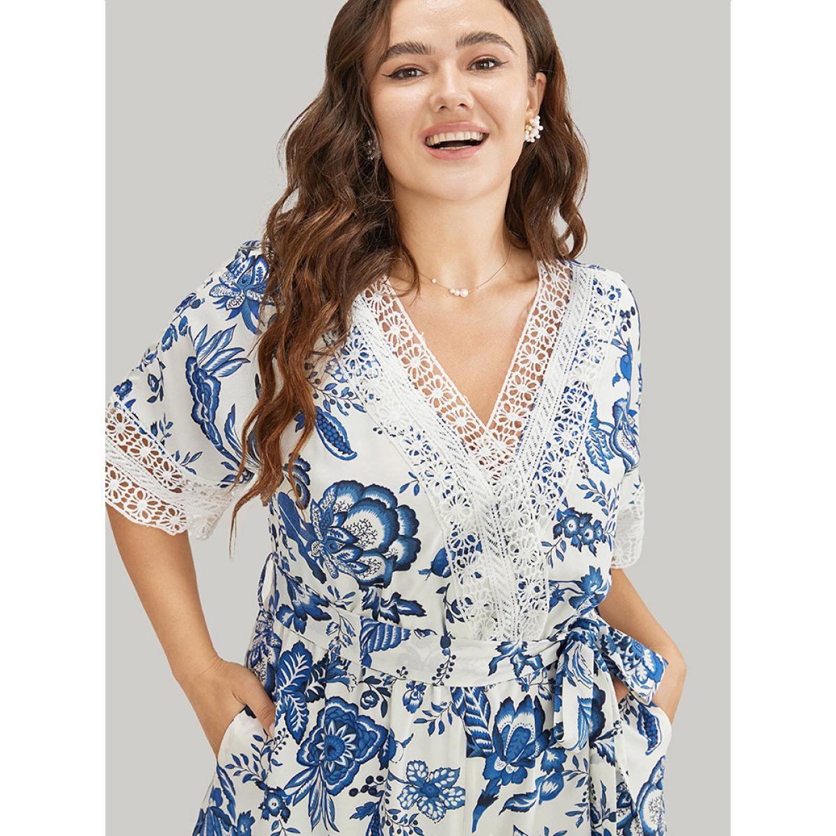 Plus Size Navy Floral Belted Pocket Lace Trim Wrap Jumpsuit Women Vacation Short sleeve V-neck Dailywear Loose Jumpsuits BloomChic 26/4X Product Image