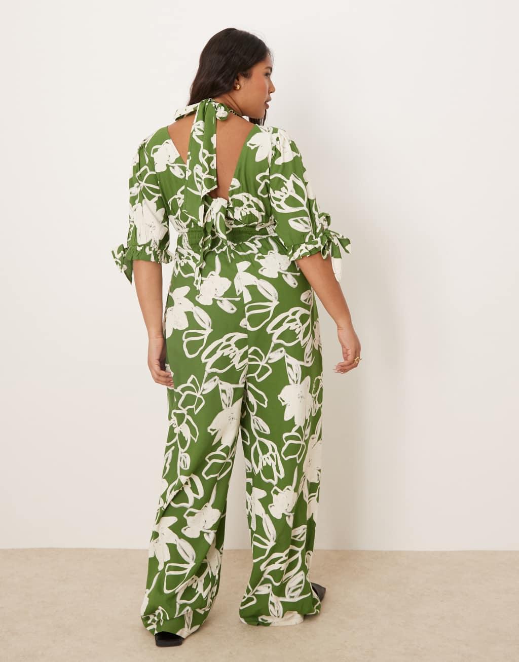 ASOS DESIGN Curve shirred waist jumpsuit in green floral print  Product Image