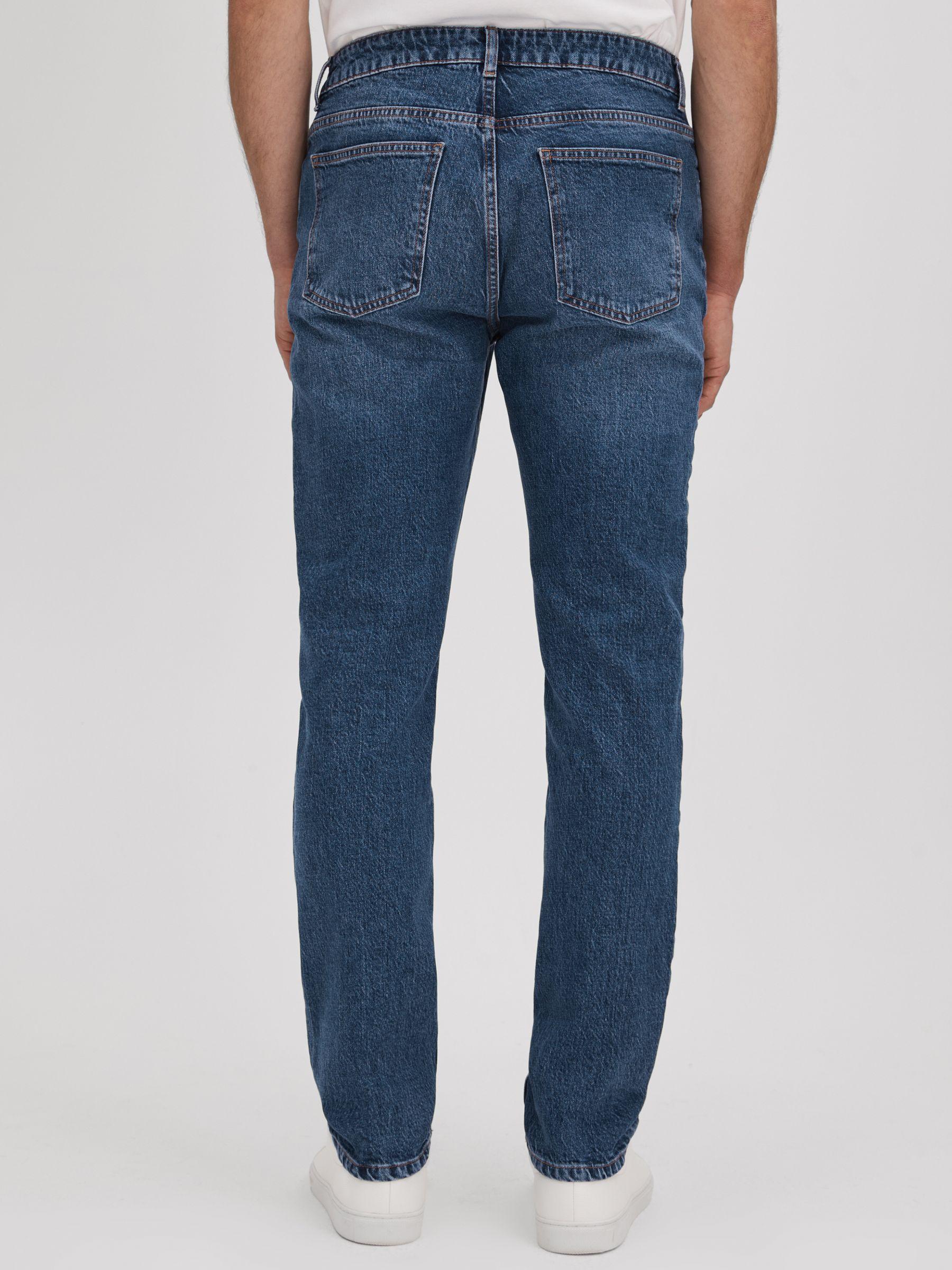 Tapered Slim Fit Washed Jeans in Mid Blue Wash Product Image
