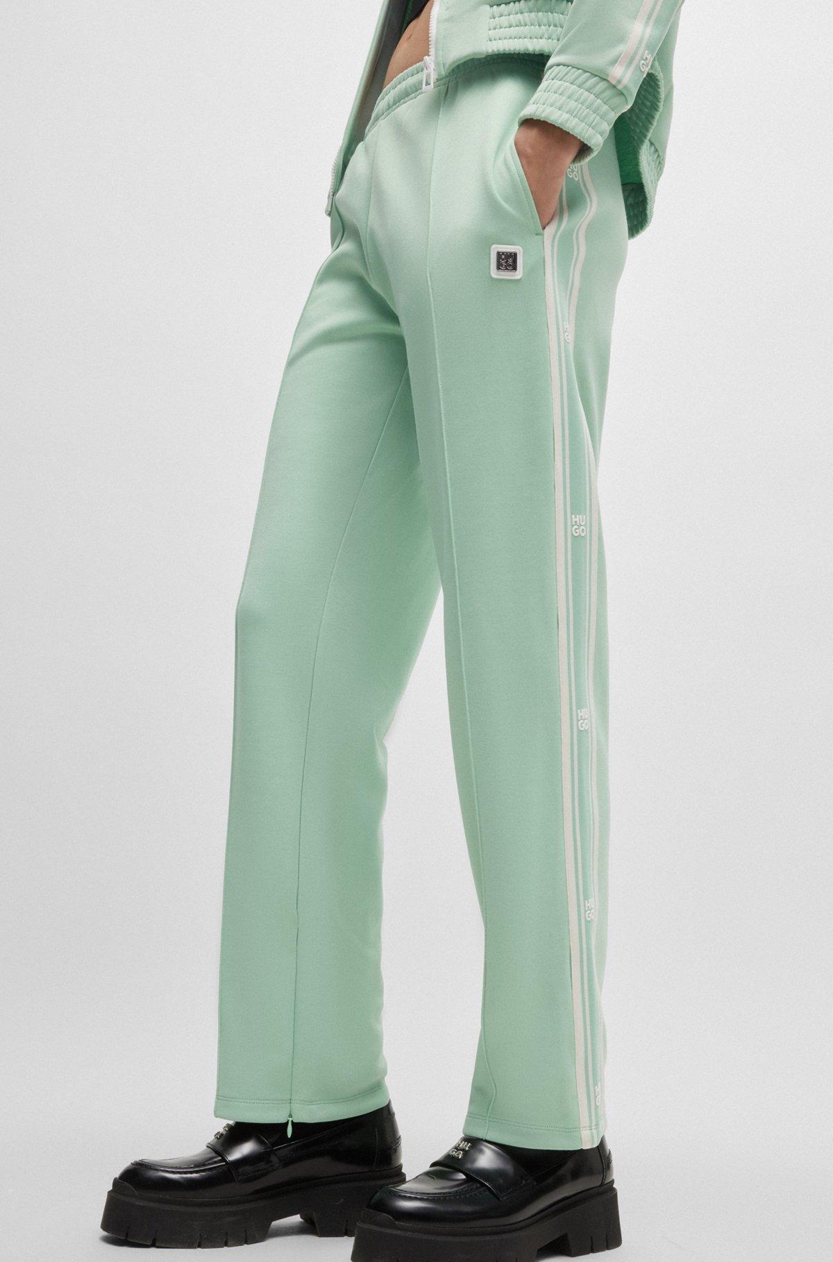 Straight-fit tracksuit bottoms with stacked logo Product Image