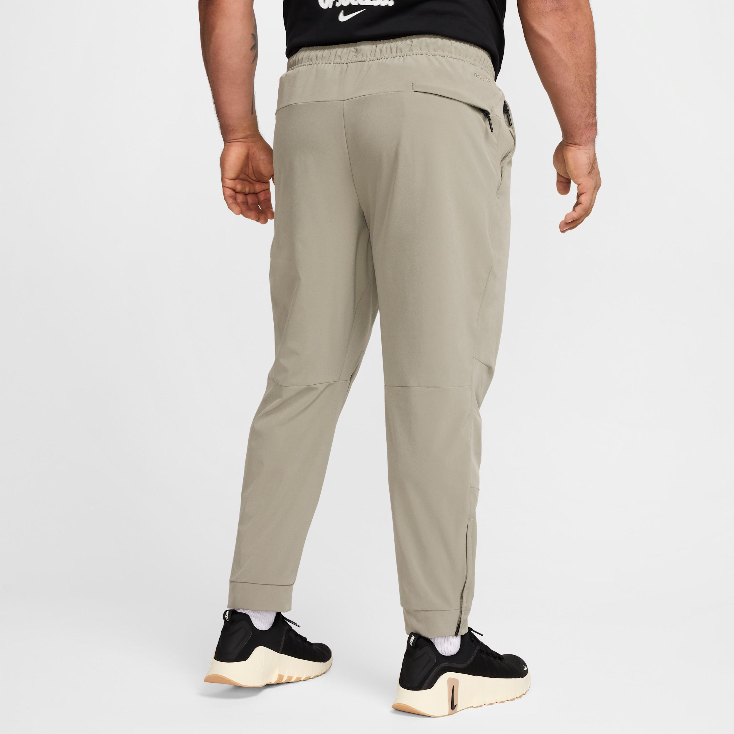 Nike Mens Unlimited Dri-FIT Zippered Cuff Versatile Pants | FB7548-320 Product Image
