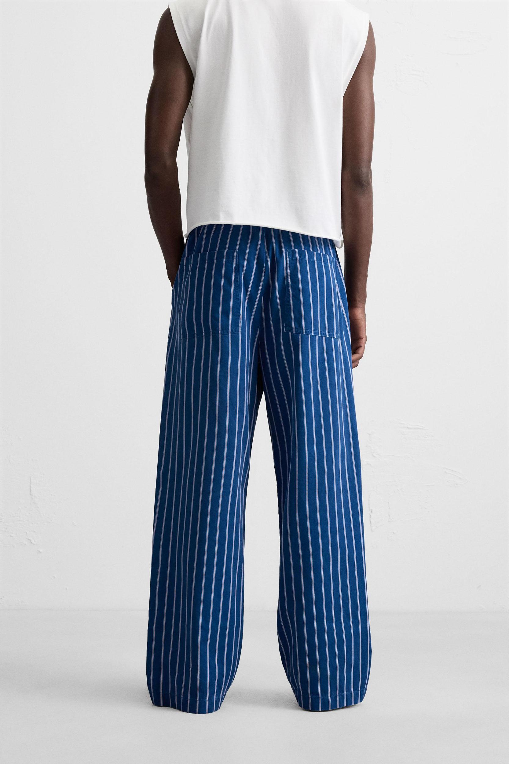 STRIPED RELAXED FIT PANTS Product Image