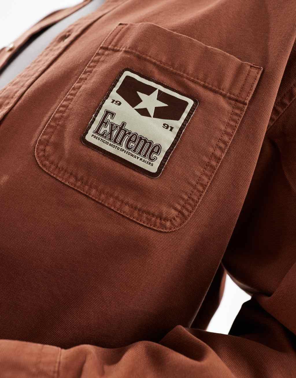 ASOS DESIGN boxy oversized shirt with placement badge in rust  Product Image