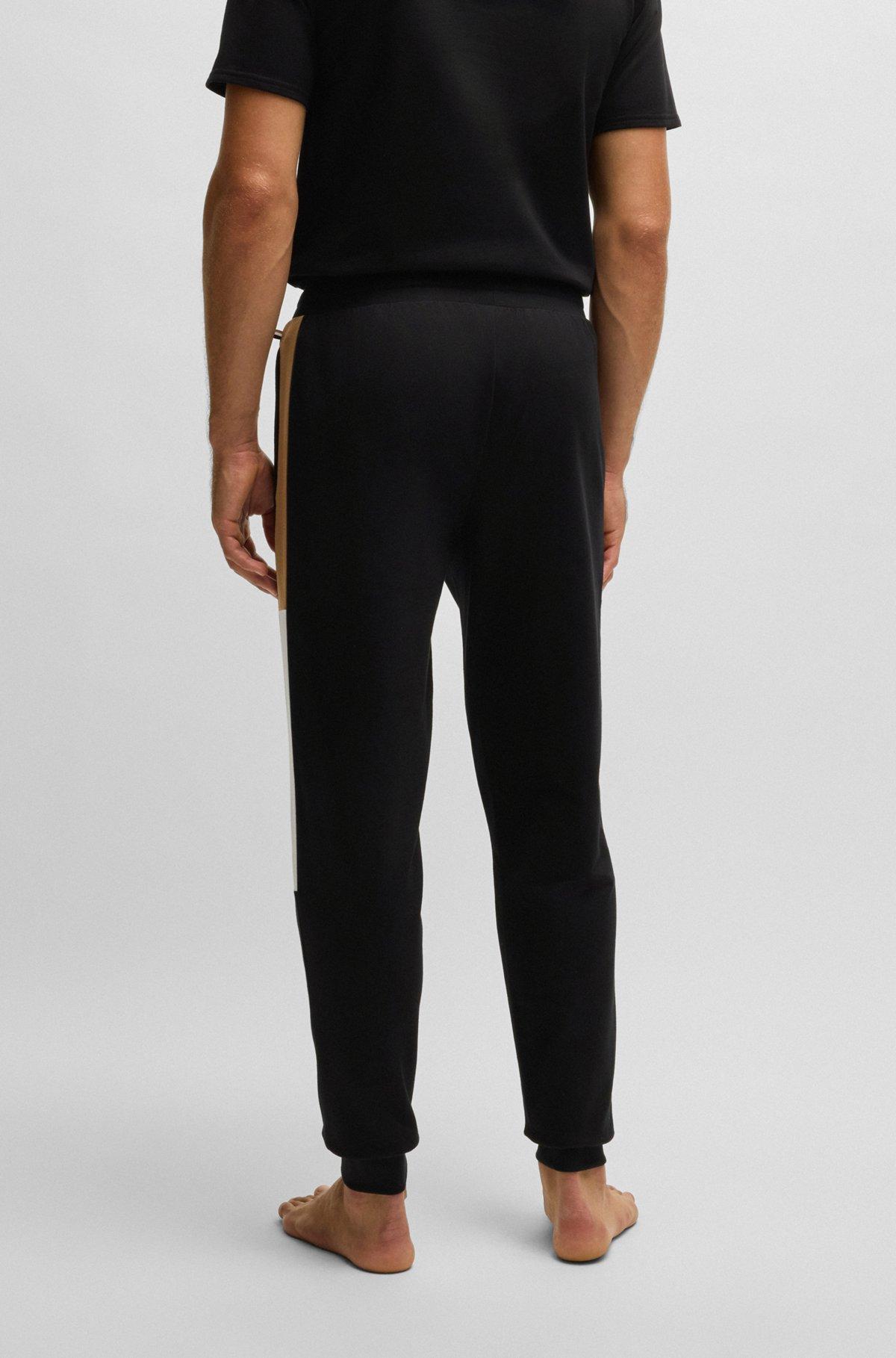 Cotton-terry tracksuit bottoms with contrast side panels Product Image