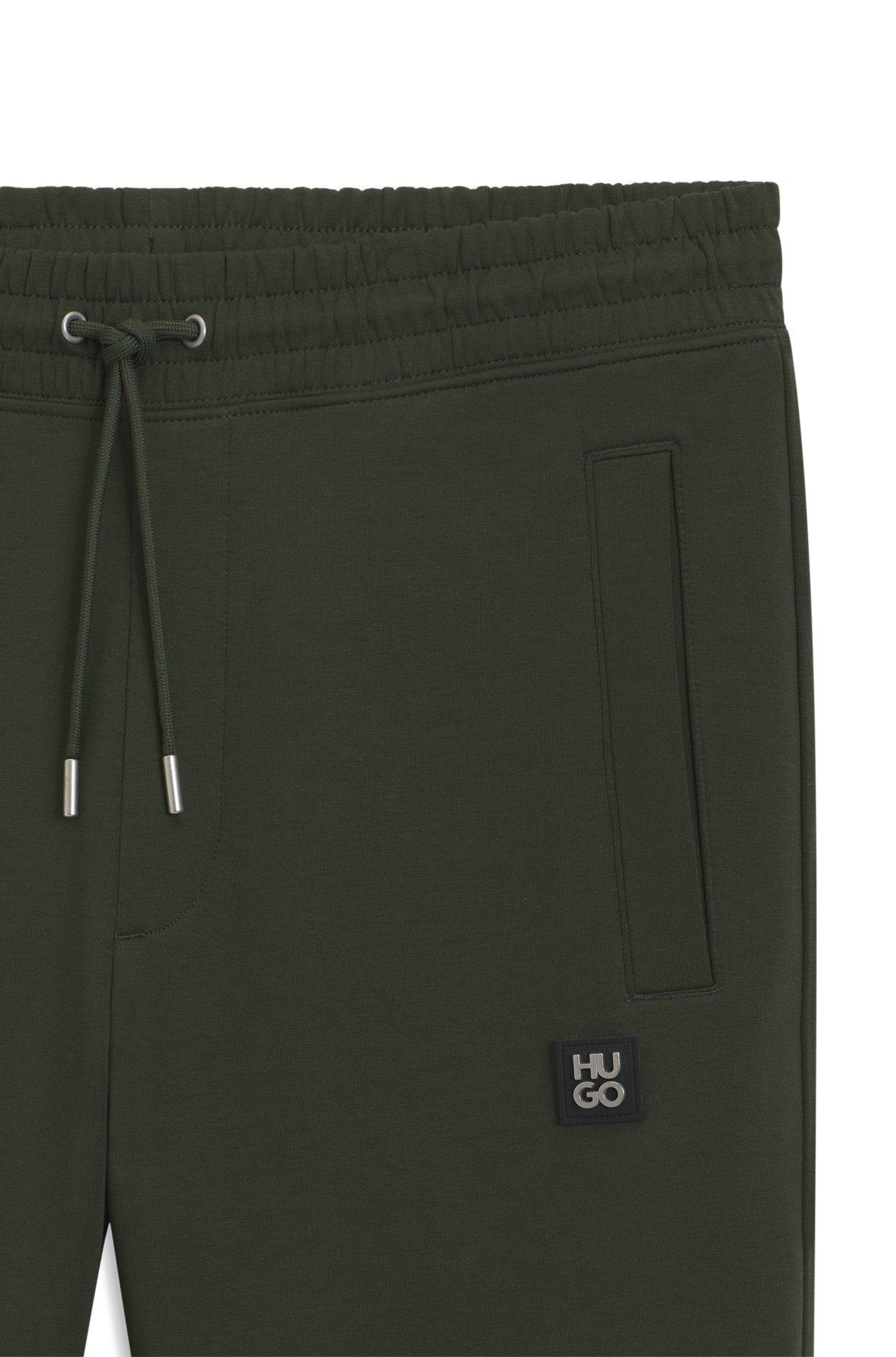 HUGO - Cotton tracksuit bottoms with stacked logo - Dark Green Product Image