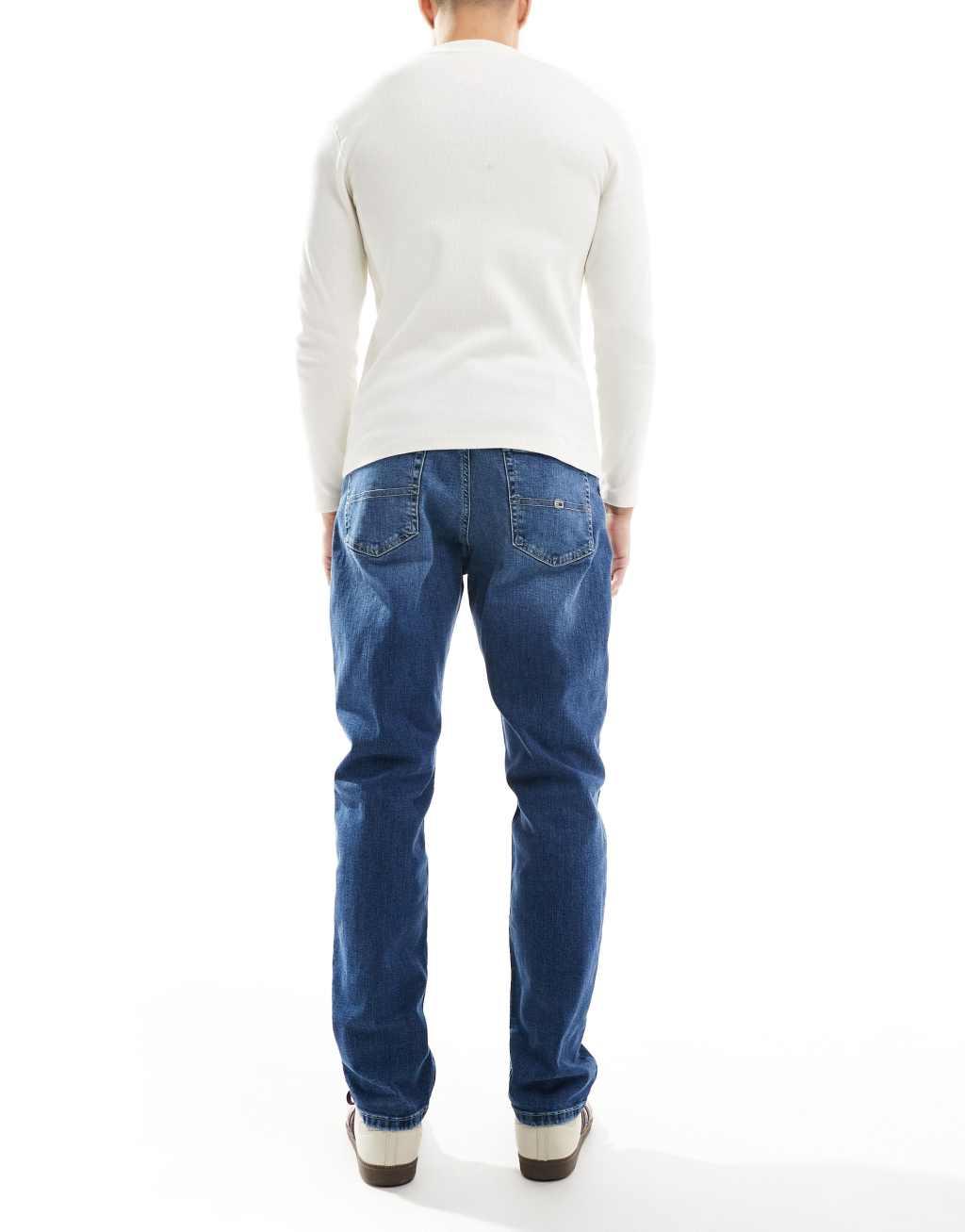 Tommy Jeans Ryan regular straight jeans in mid wash Product Image