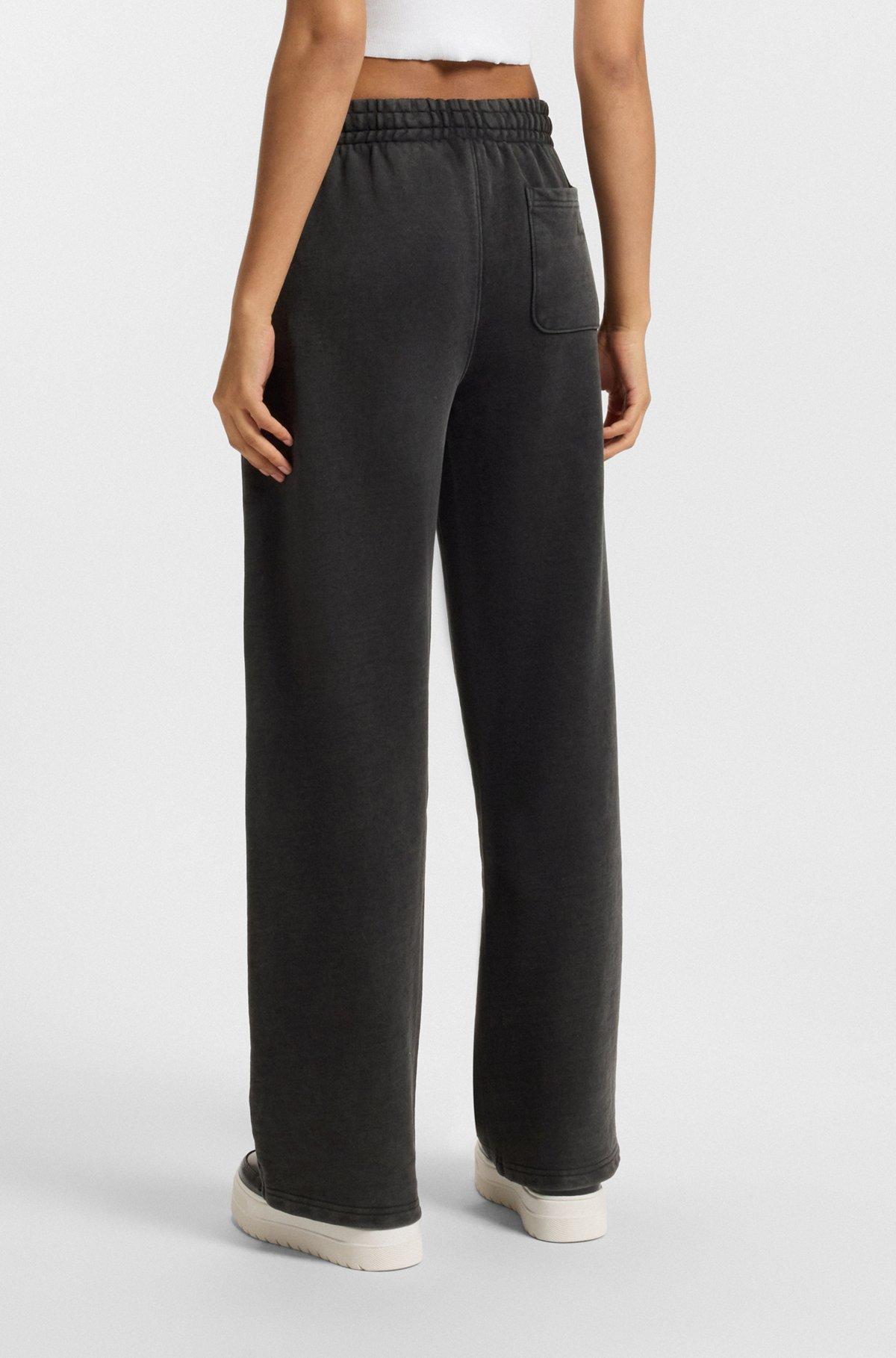 Loose-fit tracksuit bottoms in cotton terry Product Image