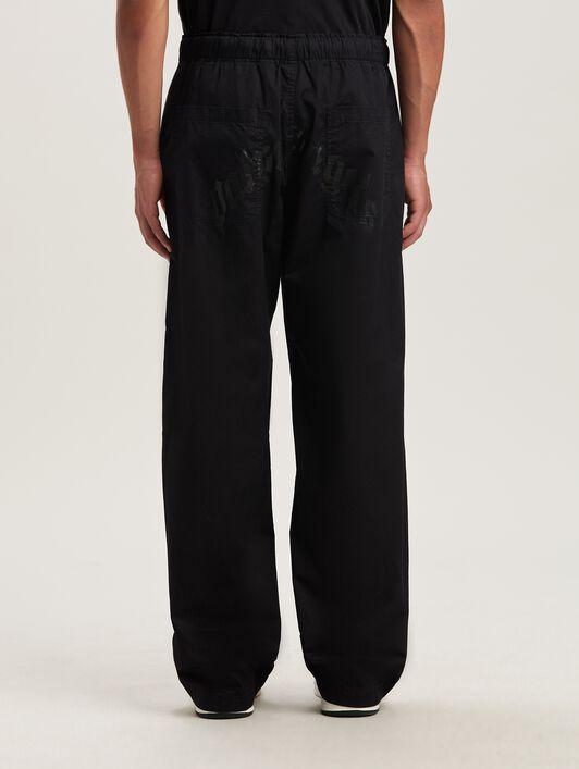 CURVED LOGO LOOSE PANTS Product Image