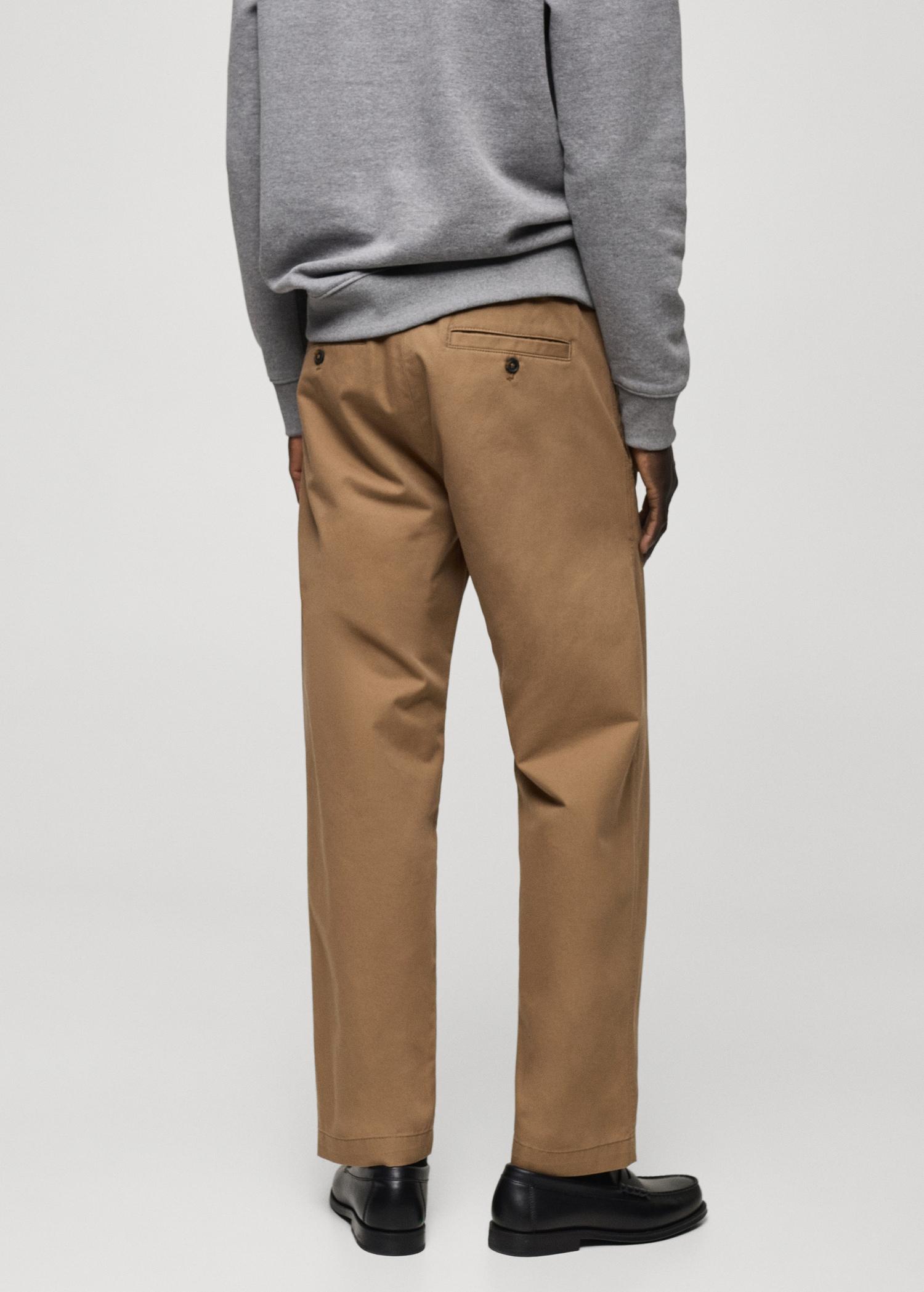 Regular-fit cotton pants with drawstring - Men | MANGO USA Product Image