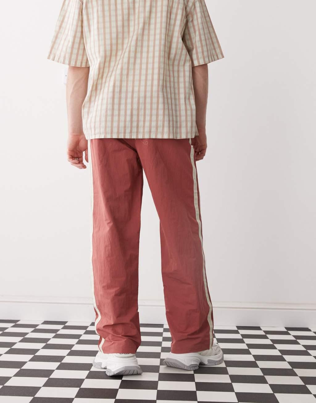 Prohibited stripe track pants in red Product Image