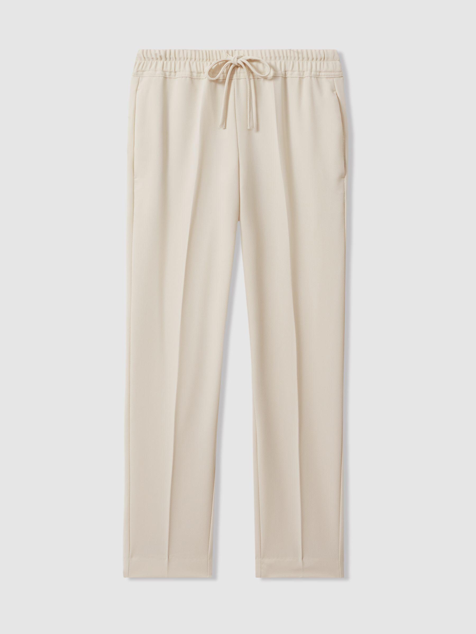 Tapered Pull On Trousers in Cream Product Image
