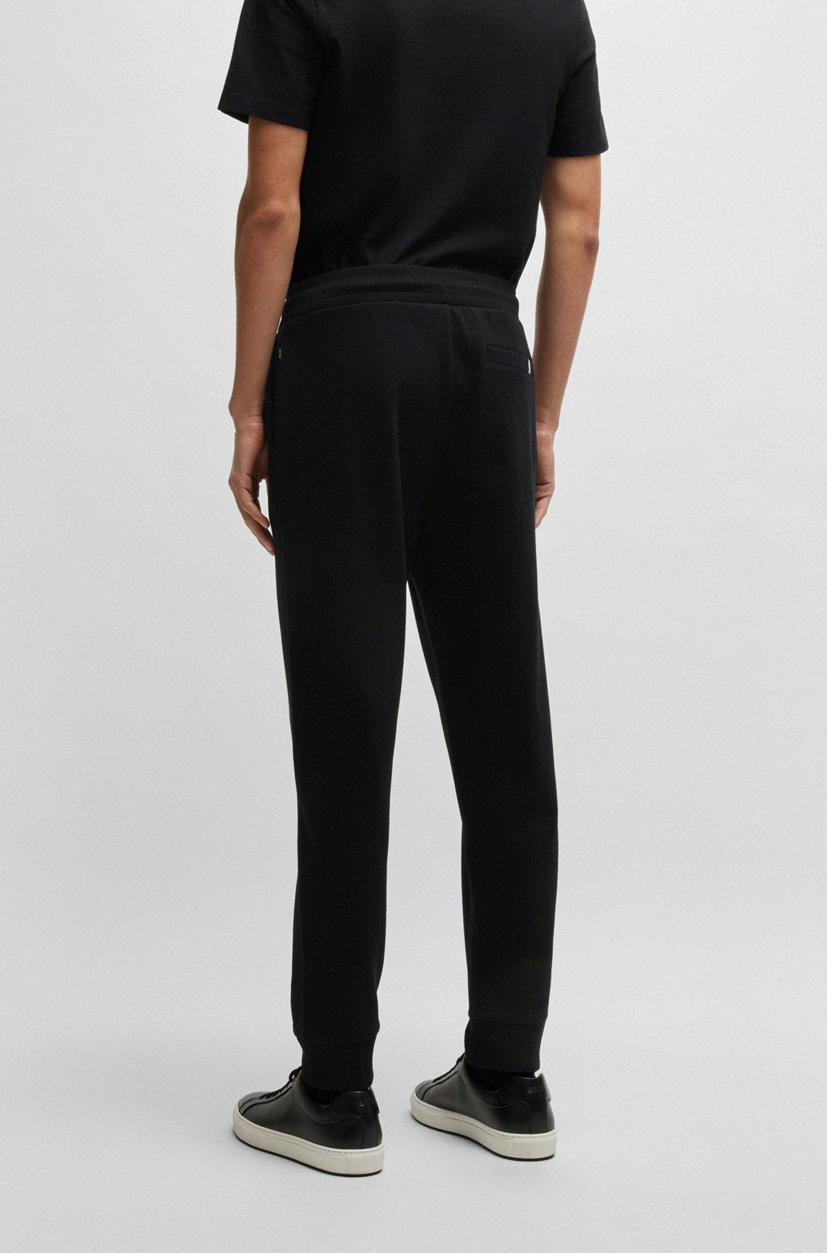 Mercerized-cotton tracksuit bottoms with stripe waistband Product Image